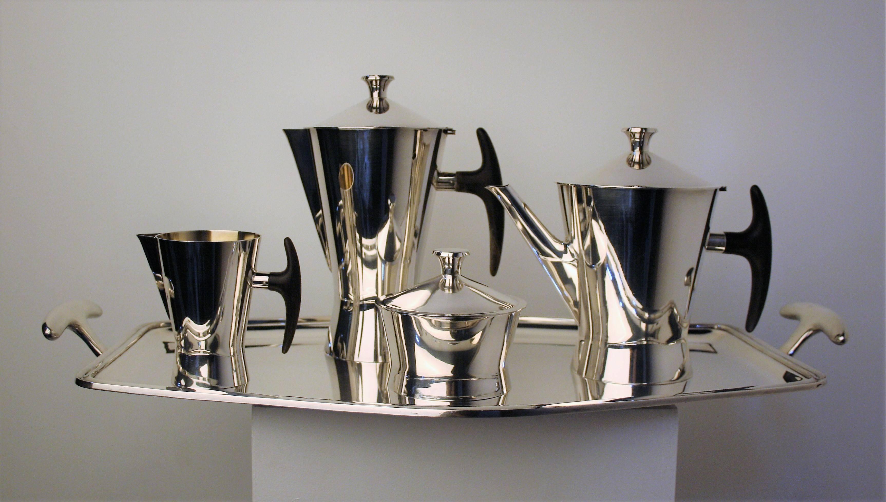 A stunning midcentury silver plated coffee and tea set designed and manufactured by the Belgian firm Delheid, as part of their 'Sivar' range of plated wares. Founded in Brussels in 1870, Delheid were one of the oldest and most respected silversmiths