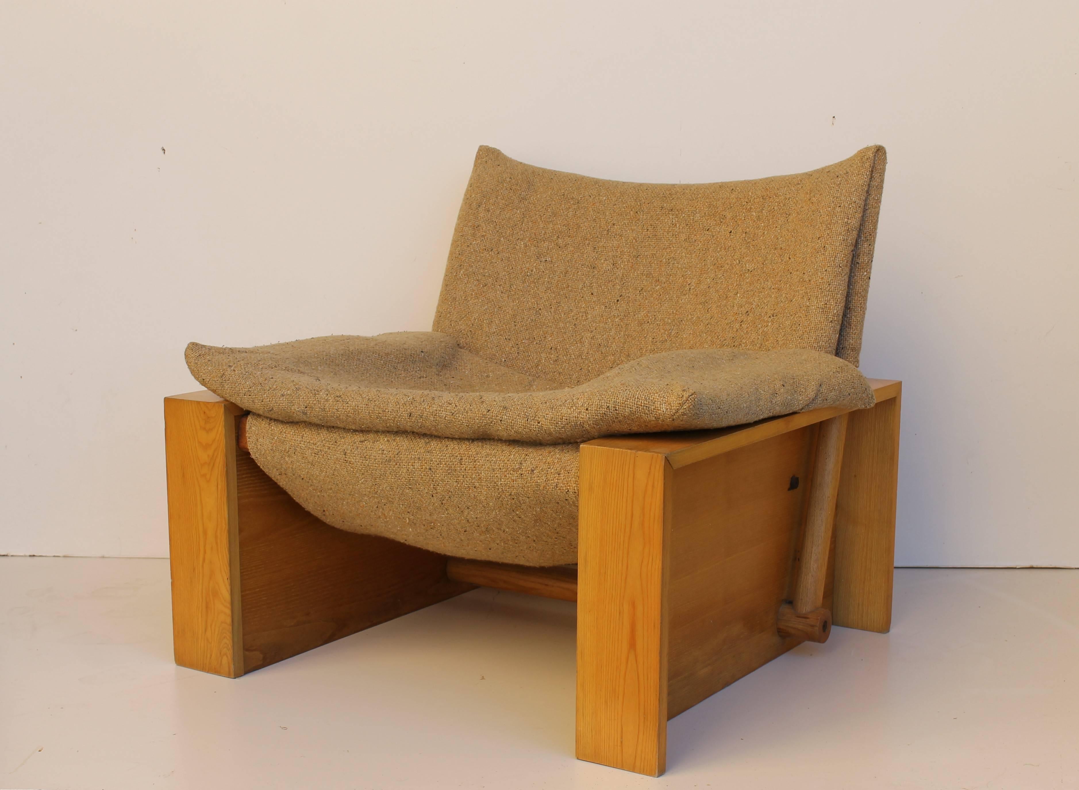 Two square lounge chairs, Italian design, dated circa 1978

Massive ash structure, camel-colored bouclé upholstery (completely removable).
