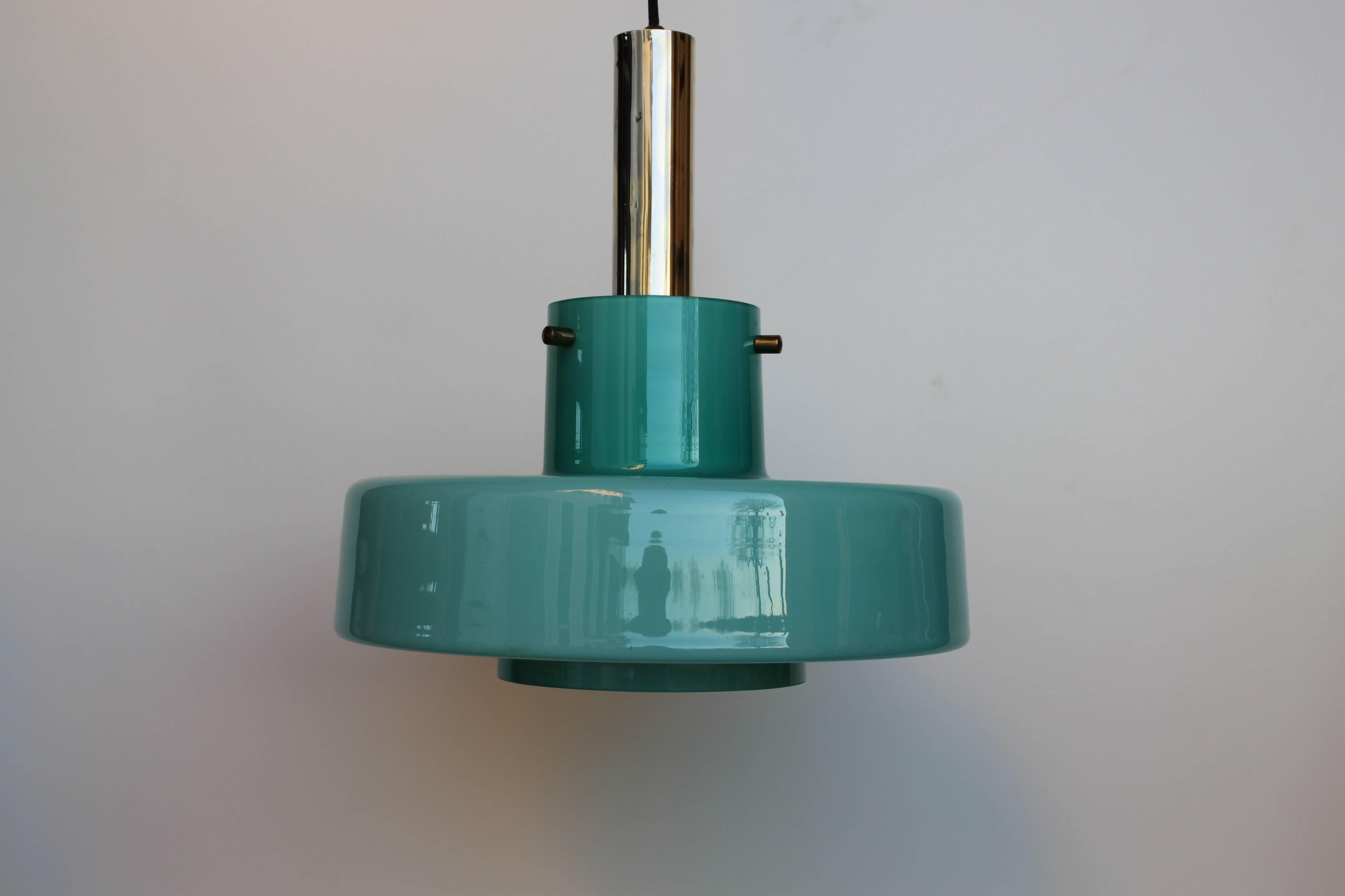 Aquamarine chandelier, dated, circa 1950. Double layer: white glass inside and aquamarine glass outside brass support.