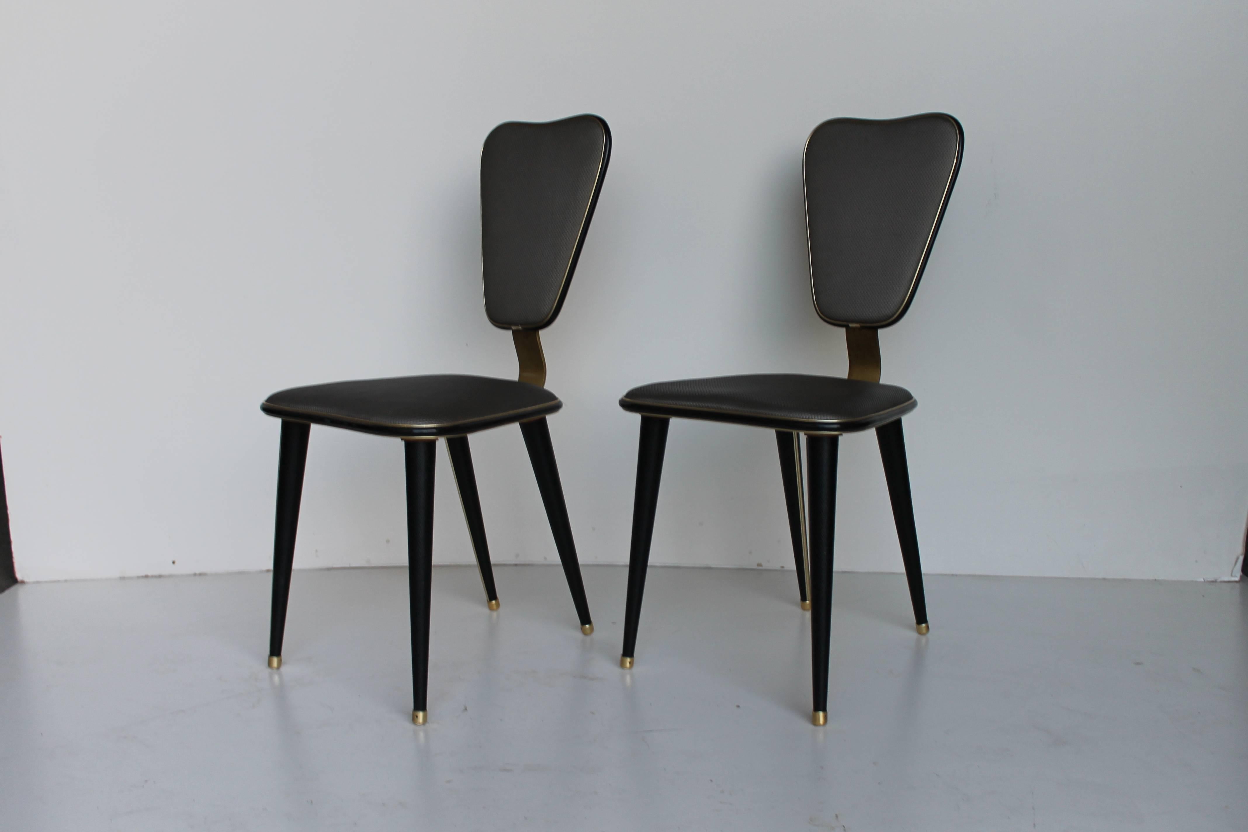 Set of four chairs designed by Umberto Mascagni, Harrods series.

Another set of four chairs (higher seat) available.
 