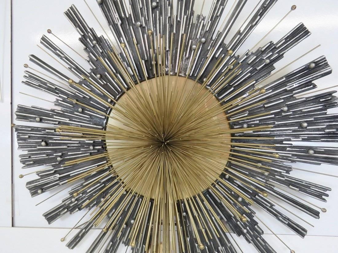 Very large brass and aluminum shooting star / starburst form wall handing by Curtis Jere. This is one of his premium works with a variety of metalworking techniques, finishes and forms on display. The large size makes a grand impression and brings a