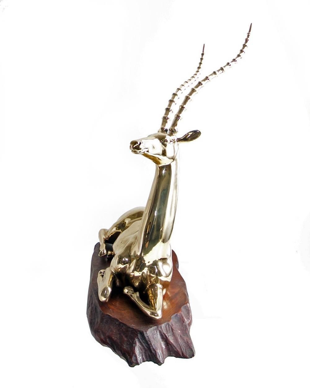 Unknown Restored Mid-20th Century Brass Sculpture of Impala on Natural Edge Wood Bas For Sale