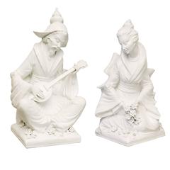 Pair of Large Blanc de Chine Musician and Maiden Figures on Pedestals