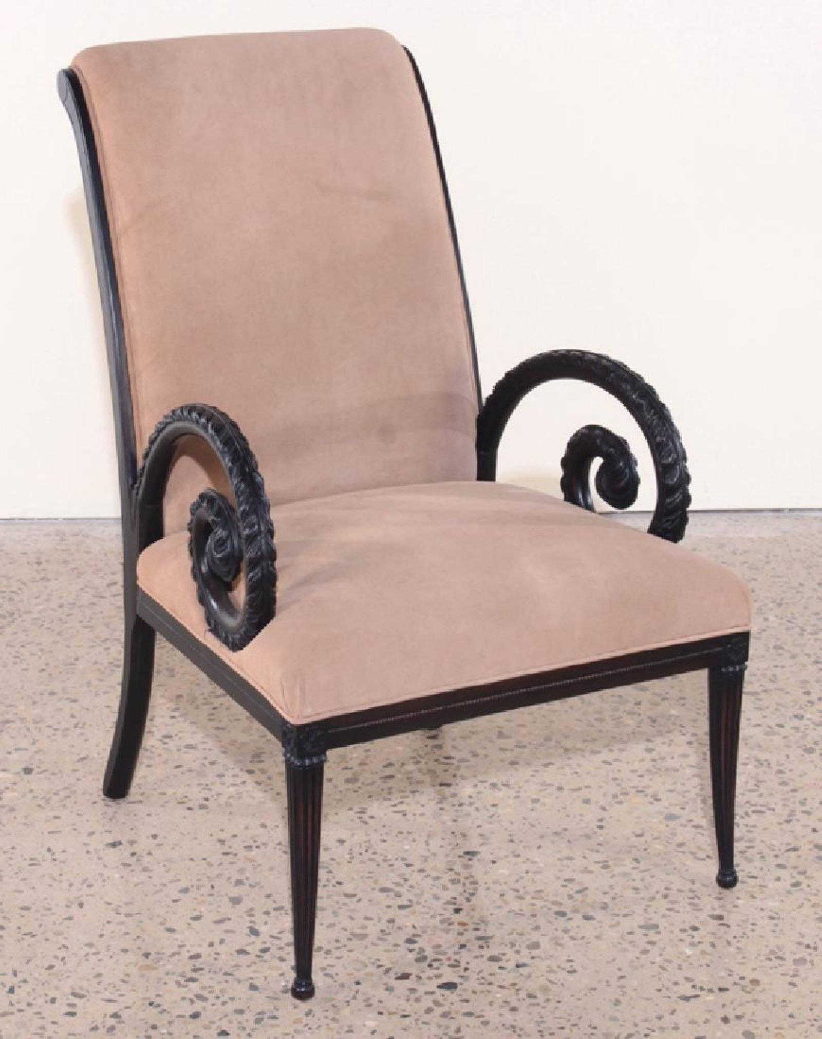 A pair of ebonized Grosfeld house upholstered chairs having open scroll form arms and resting on fluted hairpin legs, circa 1960. 

Measures: Height 38.5