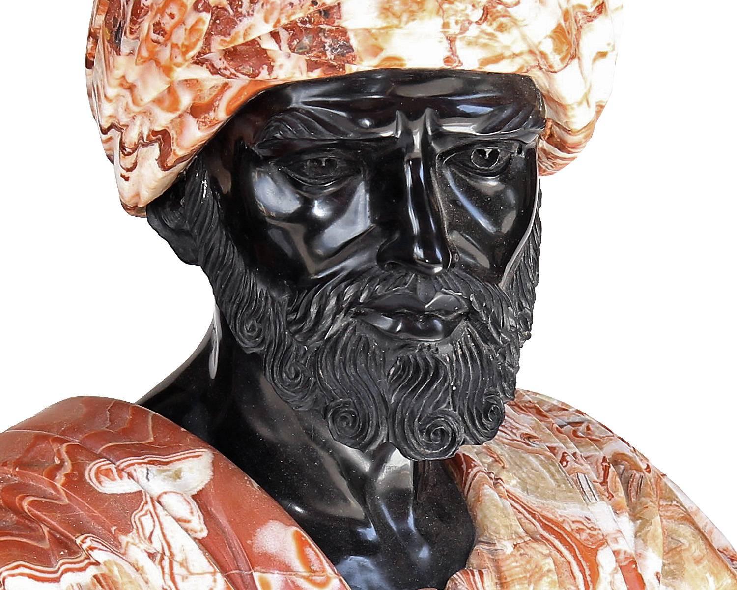 This exquisitely carved marble bust depicts a bearded man in the Orientalist style wearing both a beautiful robe and matching turban. This piece makes a big statement in terms of size, style and craftsmanship. Please notice the gorgeous details of