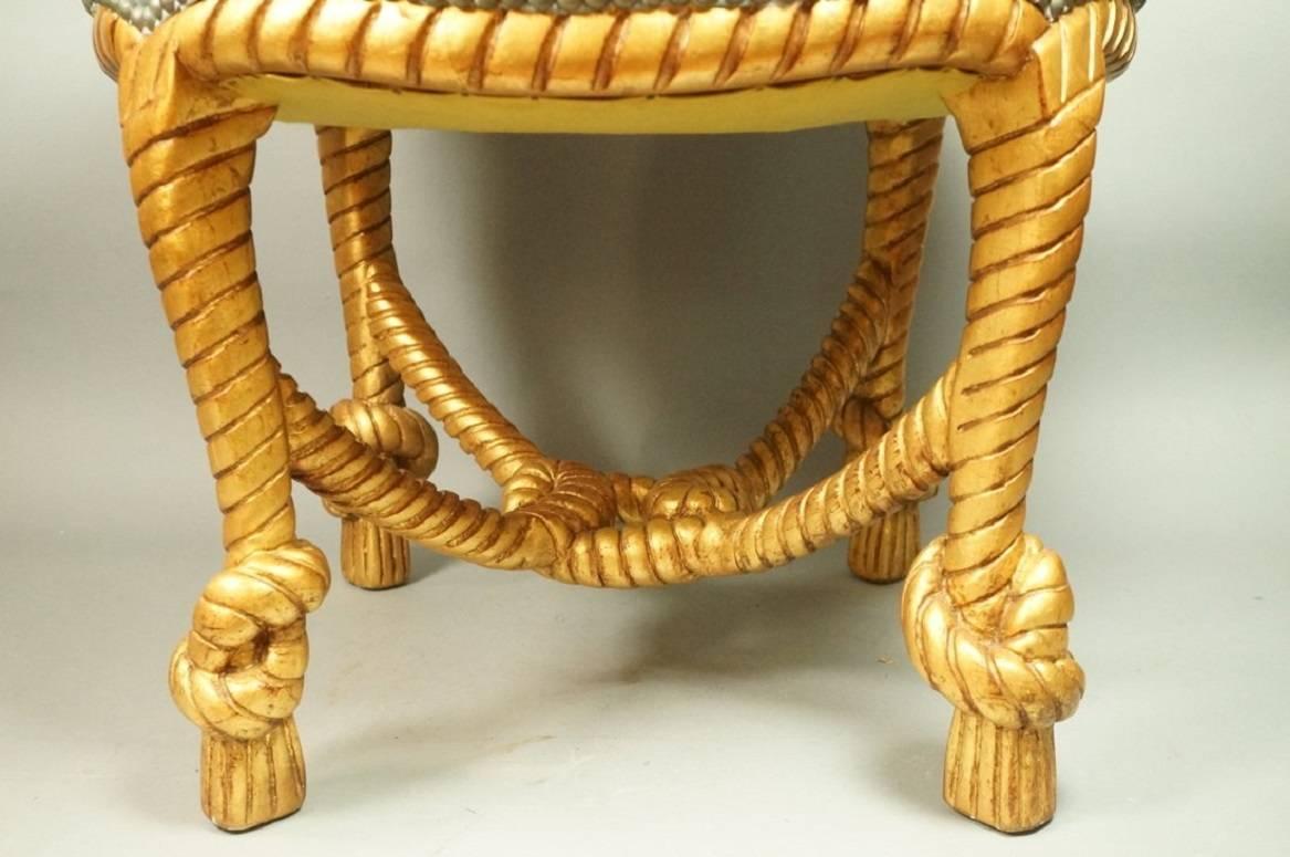 This Fournier style carved giltwood wood ottoman or stool is in the form of knotted rope. Stools of this kind, their frames imitating twisted rope, were fashionable during the third quarter of the nineteenth century and remain popular today. Gilt is