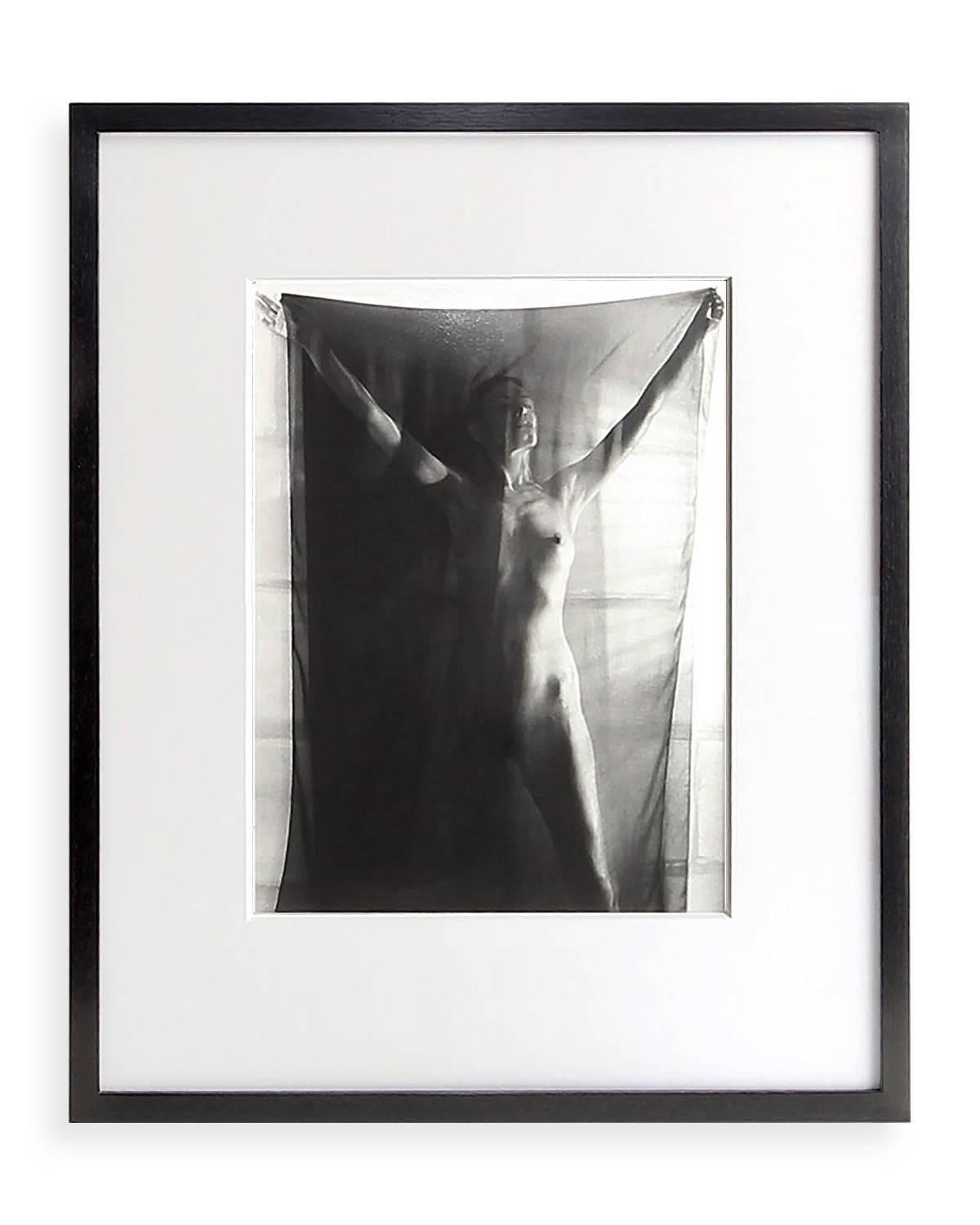 This striking photograph by female photographer is part of her 35 year study of the female form through her photography. This 1993 silver gelatin print is 11 x 14 inches and has been recently mounted in a museum quality frame with UV protection
