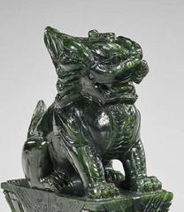 Pair of Chinese Carved Lion Sculptures in Spinach Jade on Lotus Pedestal