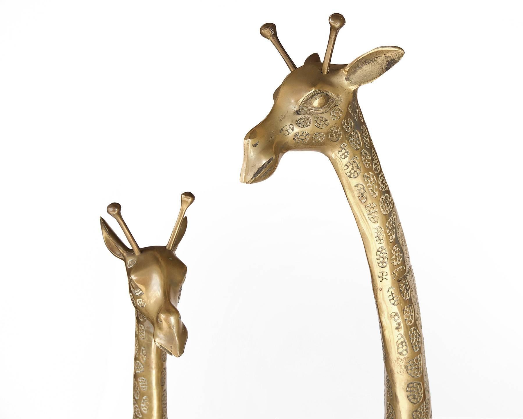 Cast Pair Hollywood Regency Style Brass Giraffe Sculptures, Male and Female, 1970s