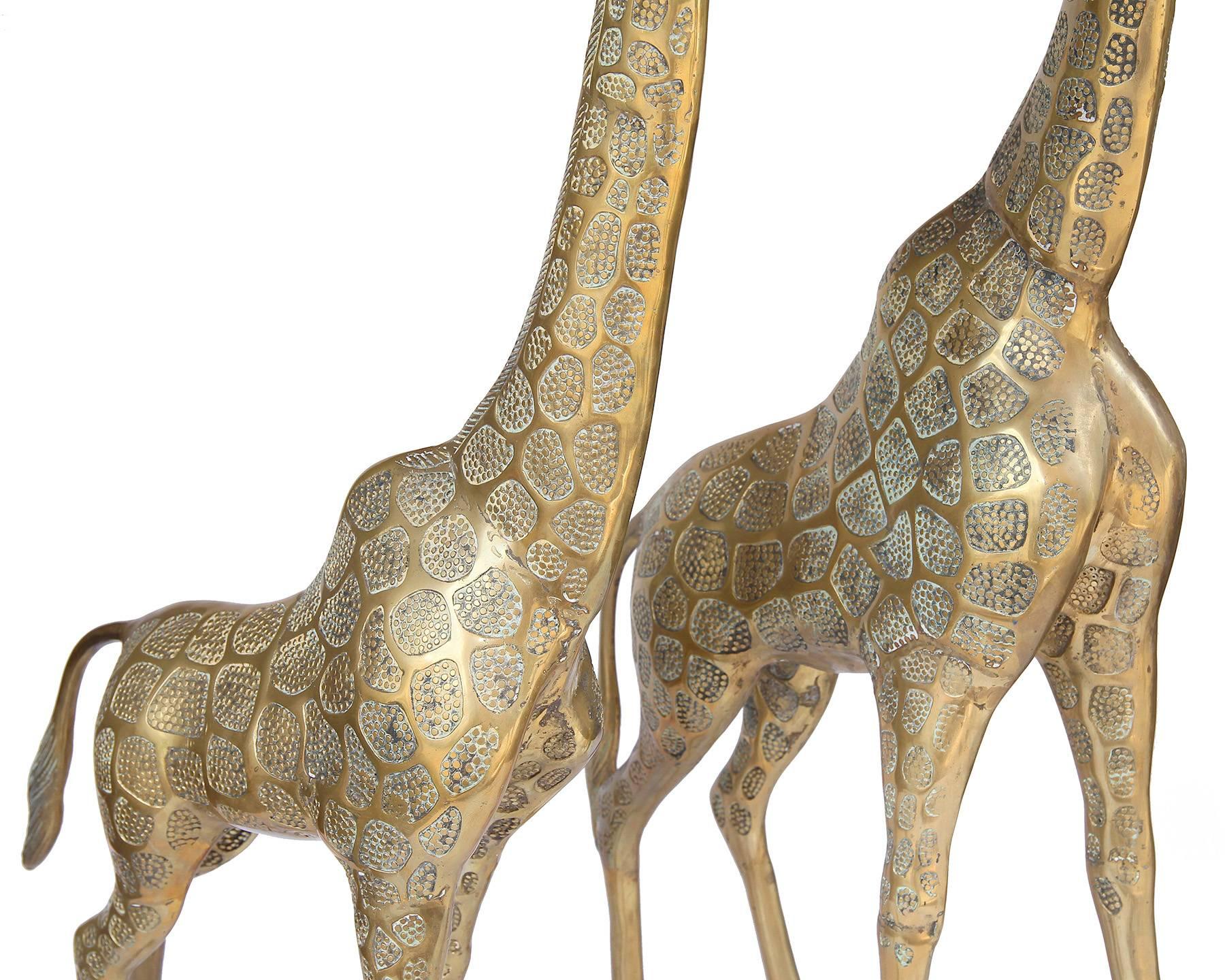 Pair Hollywood Regency Style Brass Giraffe Sculptures, Male and Female, 1970s In Good Condition In Houston, TX