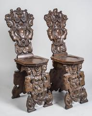 Fanciful and Charming Pair of Carved Hall Chairs