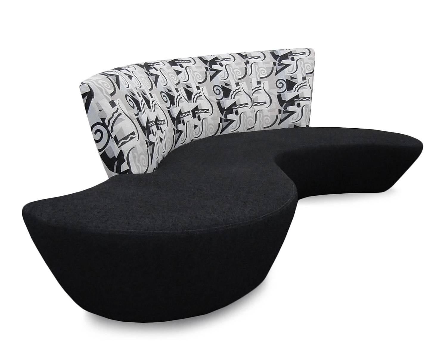 A sculptural modern sofa designed by Vladimir Kagan and inspired by the curves of the Guggenheim Museum in Bilbao Spain, circa late 1990s-early 2000s.

Measures: 95 W x 45 D x 39 H inches
  