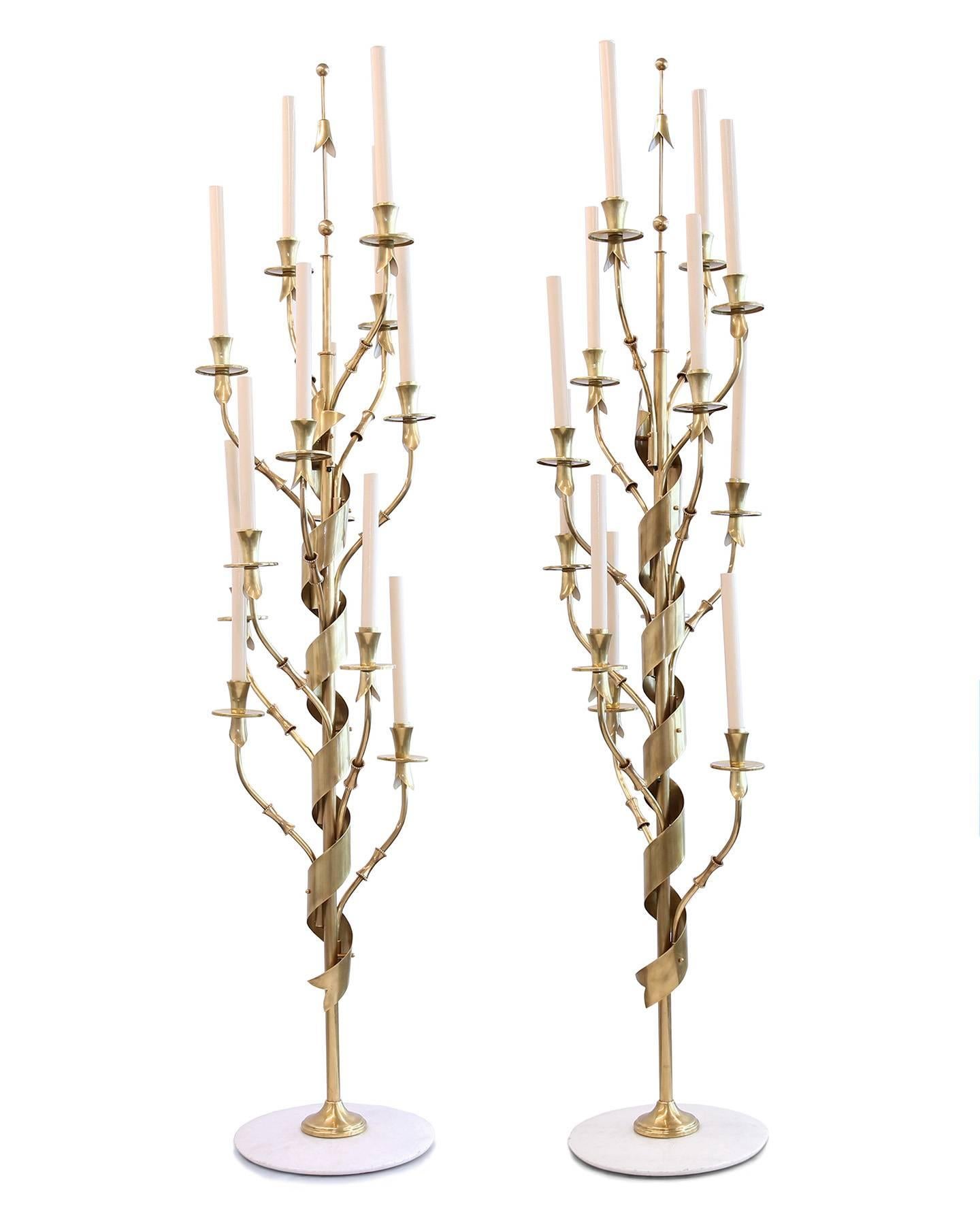 Candelabra-style brass and marble floor lamp by Stilnovo Italy, 1960s. Measures: 65'' H x 14'' D. 

These lamps have recently undergone complete restoration - including full disassembly and polishing of all brass pieces. These are show stoppers!