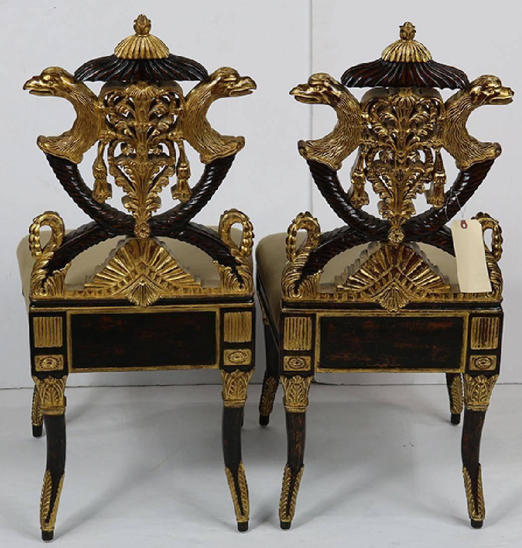 Regency Revival Pair of Carved French Empire Style Decorative Chairs of Ebonized and Giltwood For Sale