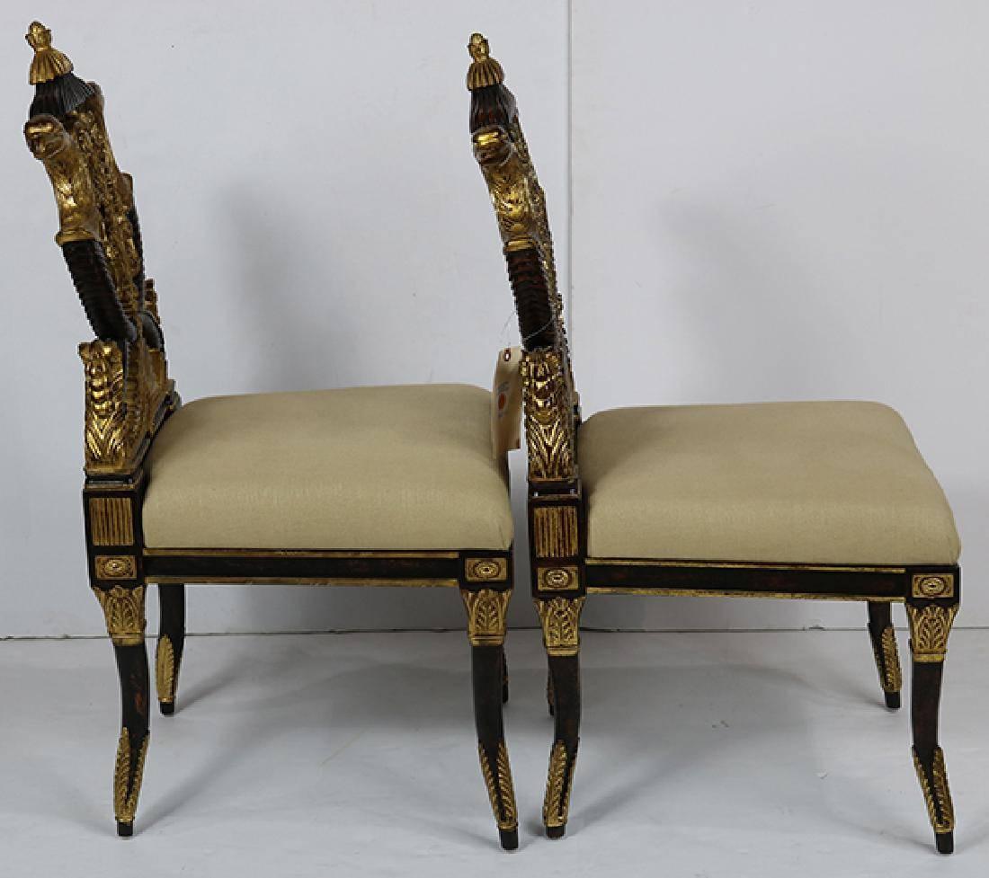 European Pair of Carved French Empire Style Decorative Chairs of Ebonized and Giltwood For Sale