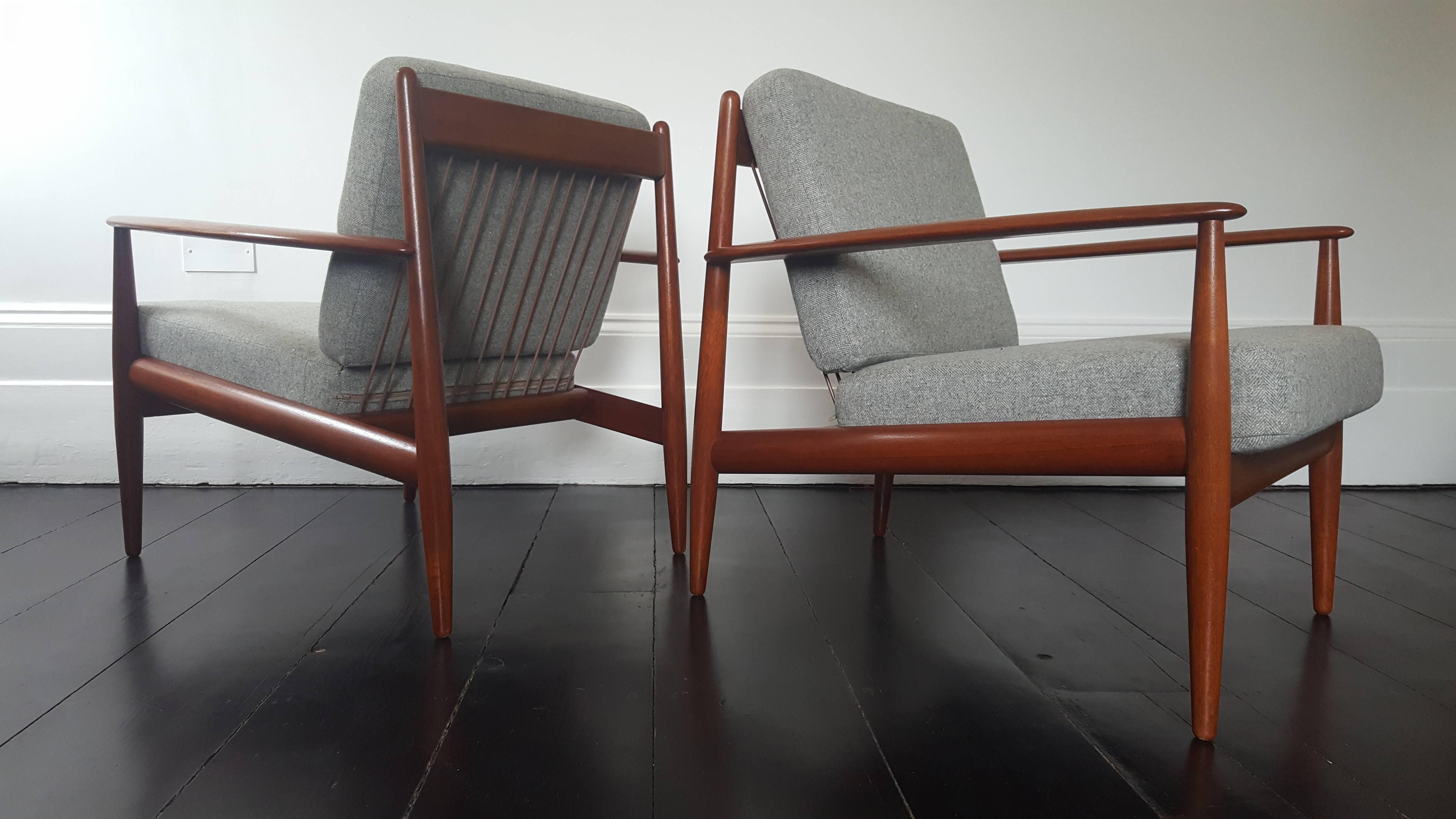 Grete Jalk for France & Daverkosen lounge chairs.

A pair of teak lounge chairs by Grete Jalk - amazing forward angled backlegs with rope/banded backs and seats - manufactured by France & Daverkosen.

Newly upholstered in Abraham & Moon Grey