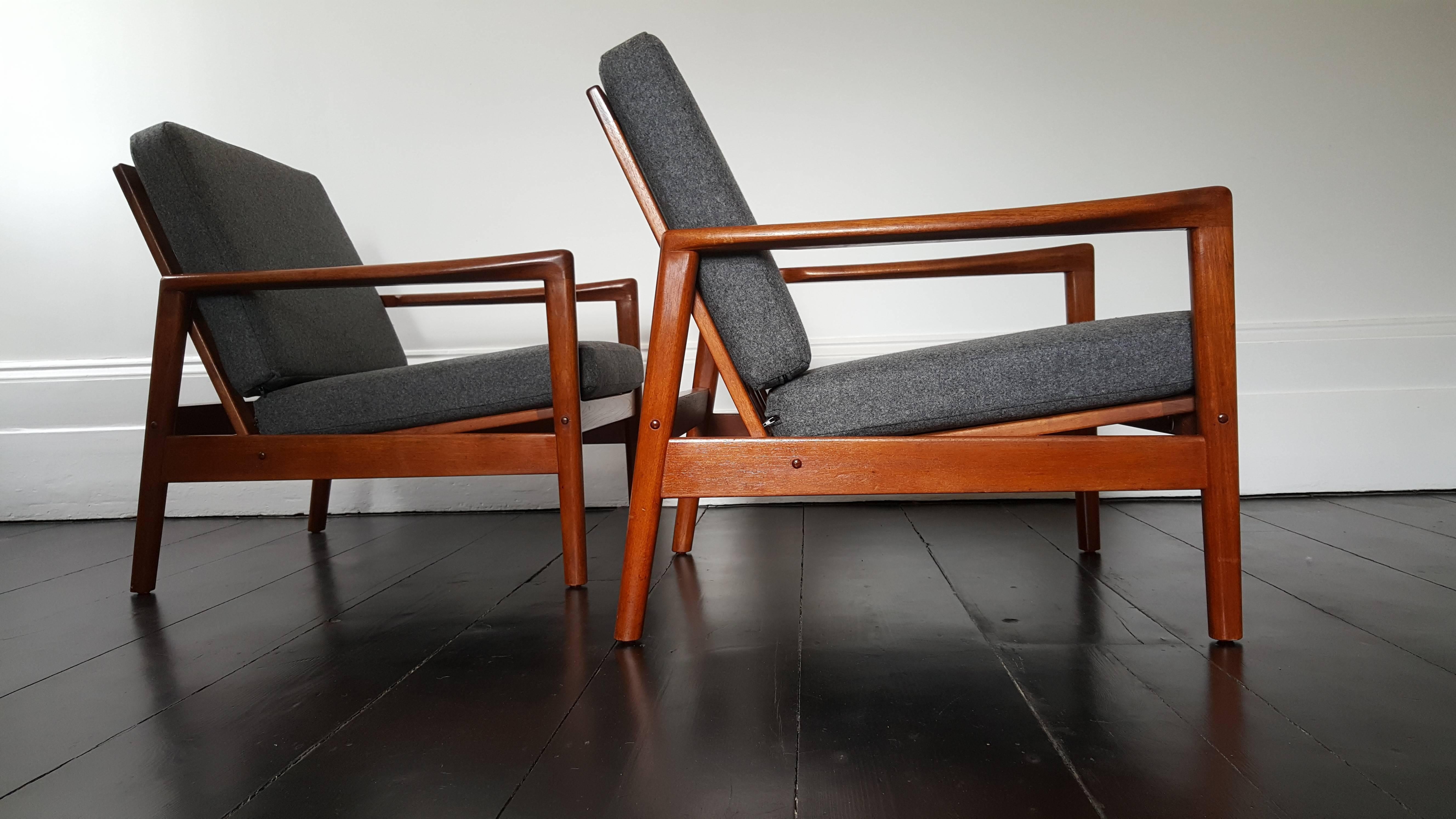 Hans Olsen lounge chairs for Juul Kristensen, 1960s.

A pair of solid teak lounge-chairs by Hans Olsen - beautifully shaped arms.

Newly upholstered in Abraham & Moon upholstery.