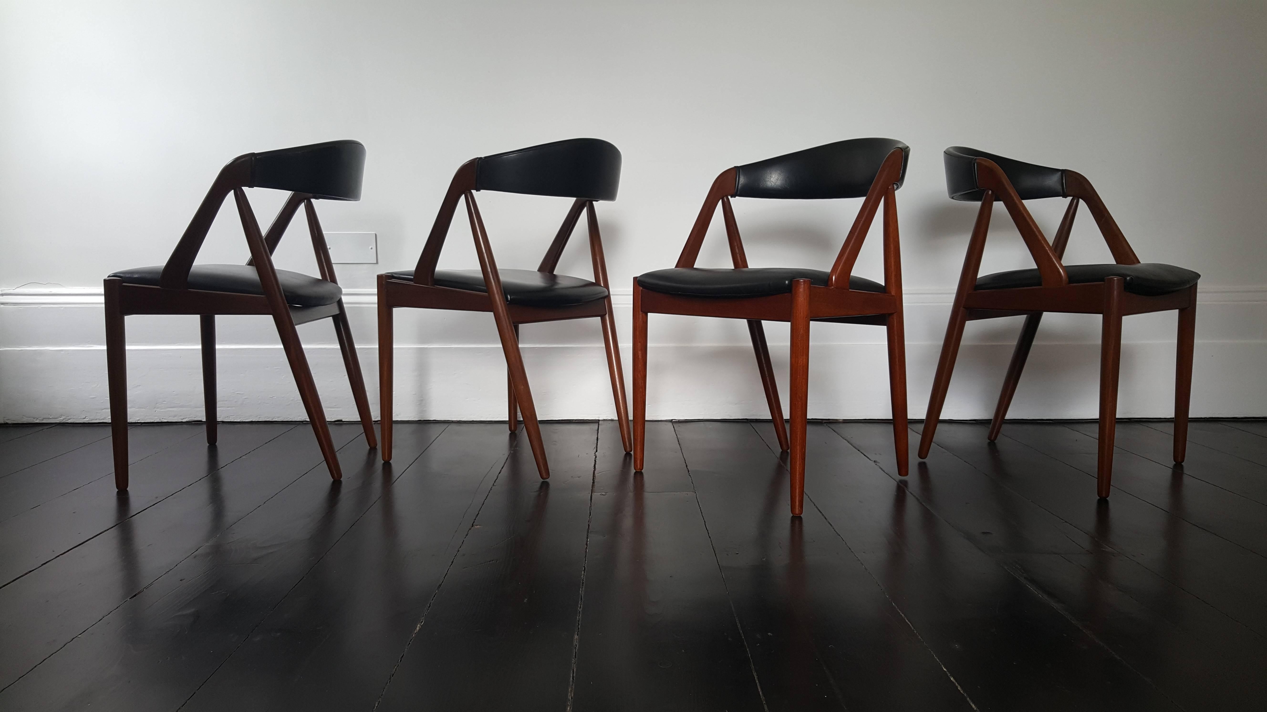 Amazing four Kai Kristiansen model 31 teak 'A' frame dining chairs for Schou Andersen 1960s, original faux black leather upholstery.

We provide very competitive global shipping rates per your requirements - please click the 'ask the seller' button