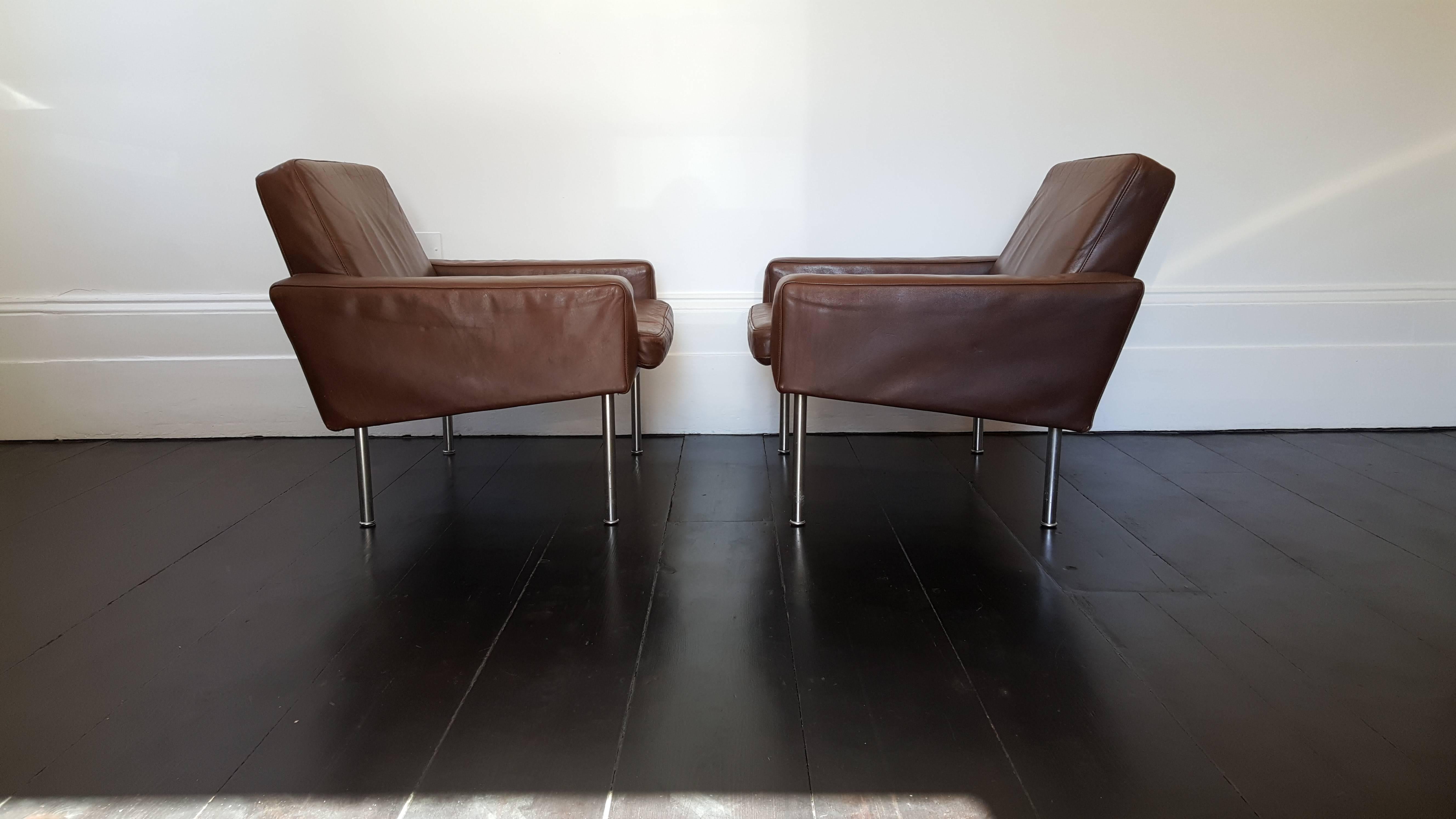 Stunning pair of Hans J. Wegner airport chairs model 34/1 on steel legs. These come with the original leather, hard to find chairs, great looking & comfortable.

Hans J. Wegner was certified as a joiner in 1931. After starting his career as a