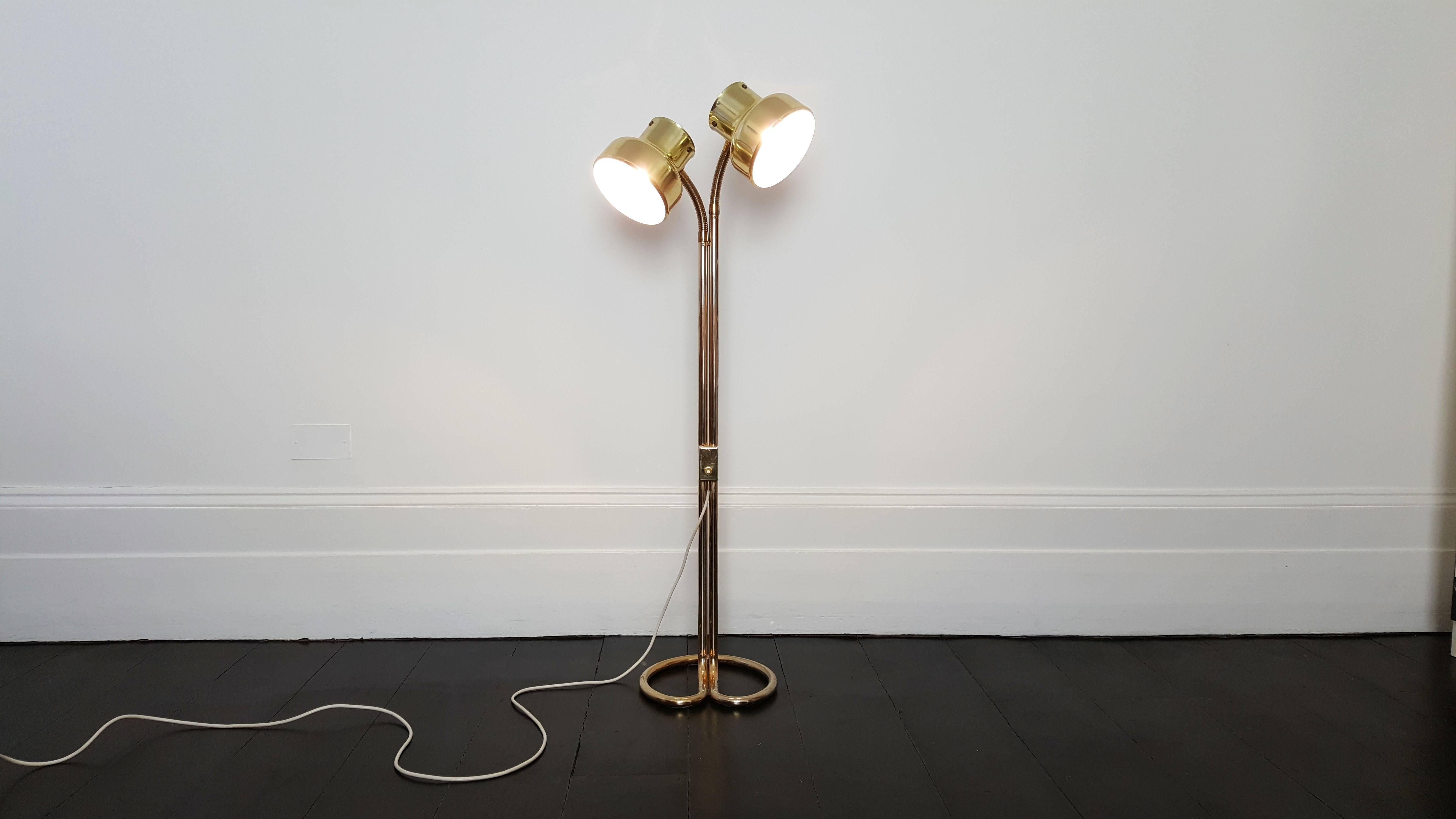 Brass double "Bumling" goose-neck floor lamp by Anders Pehrson for Ateljé Lyktan, Sweden, 1970s. 

Anders Pehrson took over the company in 1964. He would come to put his personal stamp on development in the company until the end of the