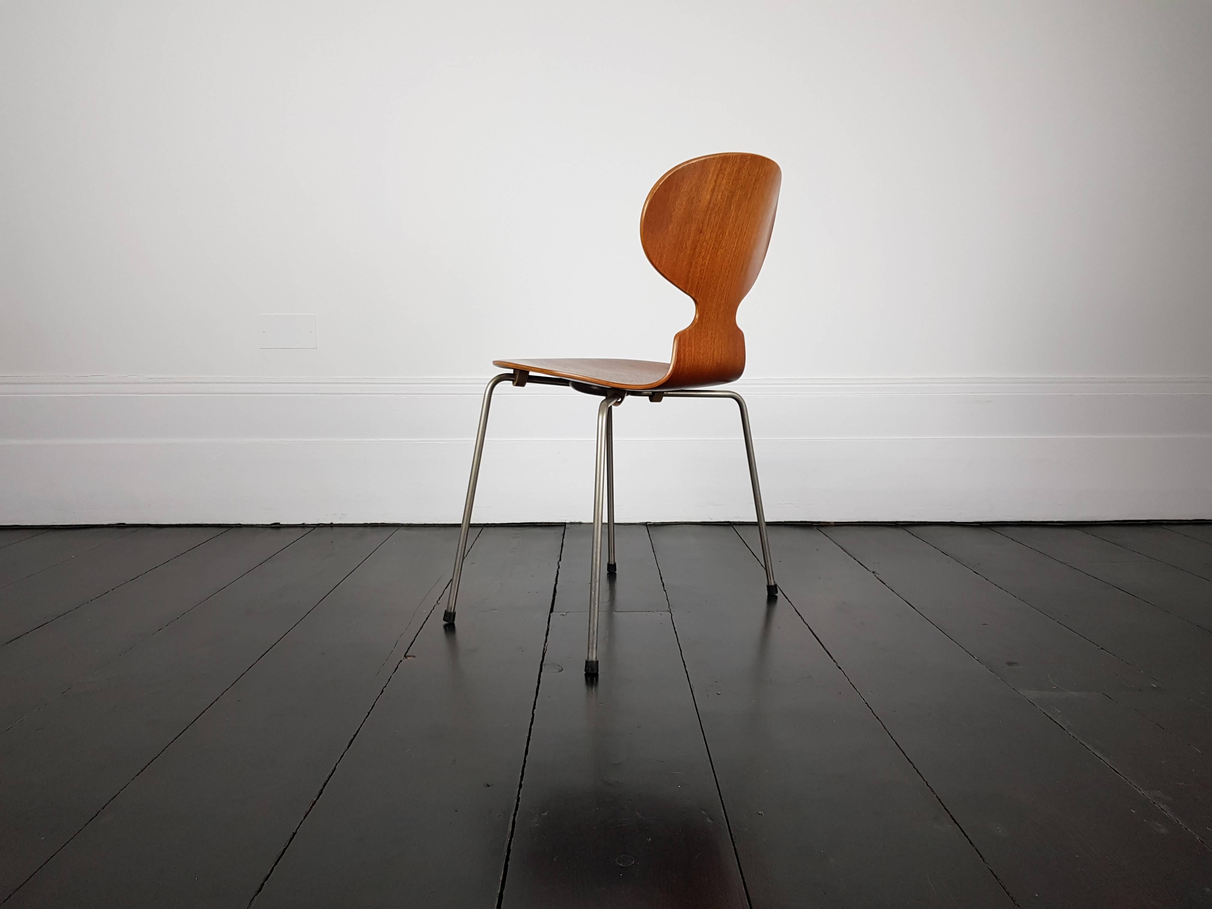 Iconic model 3100 'Ant' chair by Arne Jacobsen for Fritz Hansen.

Model 3100 'Ant' chairs were designed by Arne Jacobsen in 1952. Teak veneer on steel frame. This chair produced and stamped, 1969.

 
