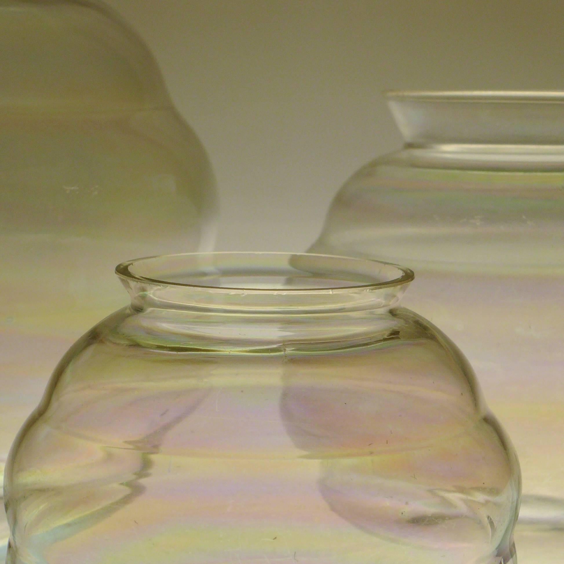 Set of three Violin vases with iridescent luster by Andries Copier (1883-1948) signed CA. Produced at Royal Leerdam Glassworks, circa 1929. A leader in the Art Deco 'Amsterdam School' style. Leerdam Glass is known for clean, simple, organic forms