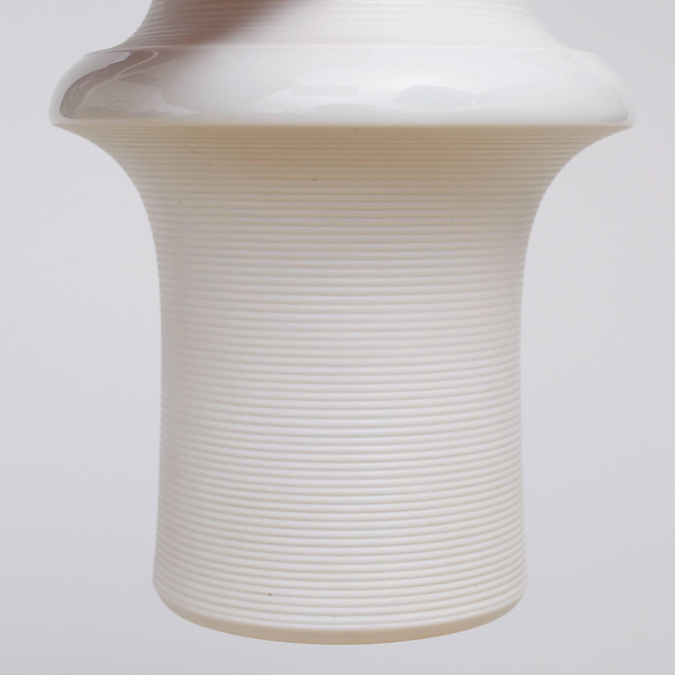 White-glazed porcelain vase, design Tapio Wirkkala, circa 1960,
executed by Rosenthal / Germany.