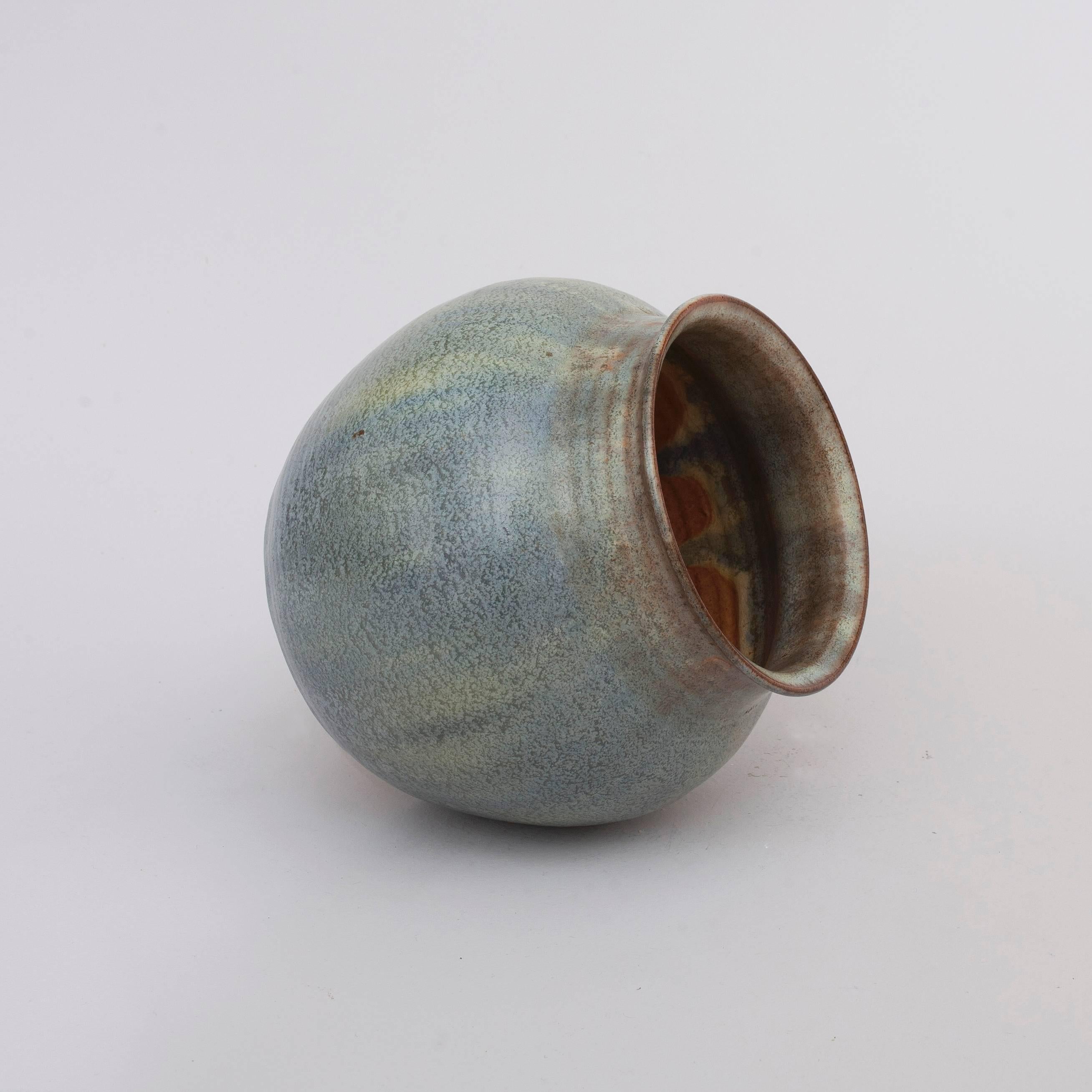 Small ceramic vase by Dutch sculptor and ceramist W.C. Brouwer, made in his own workshop. The vase is signed by Brouwer on the bottom.