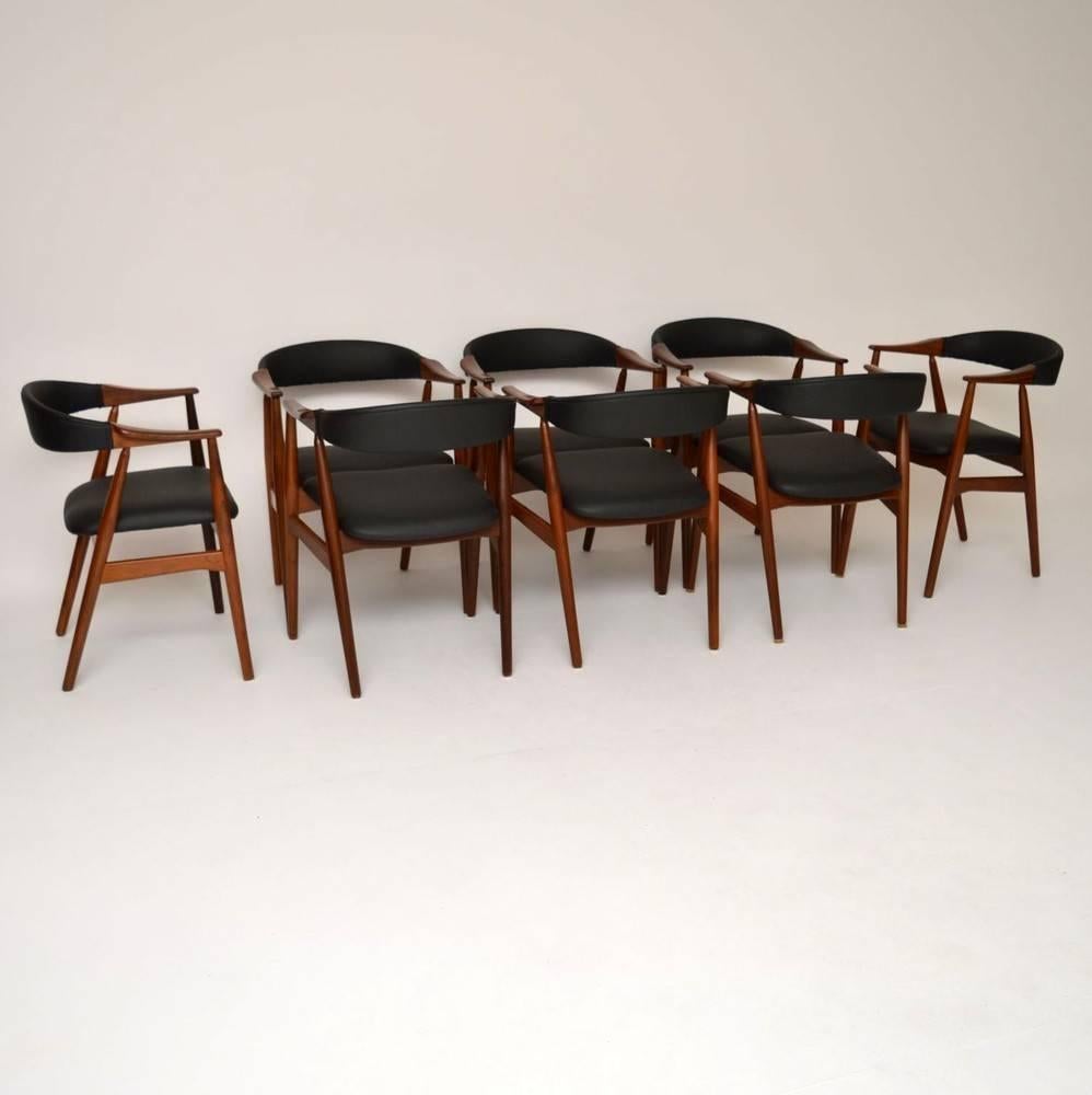 A stunning set of eight dining chairs, these were made in Denmark and date from the 1960s. The frames are solid Afromosia wood, we've had them fully stripped and re-polished to a very high standard, the colour and grain patterns are beautiful. We