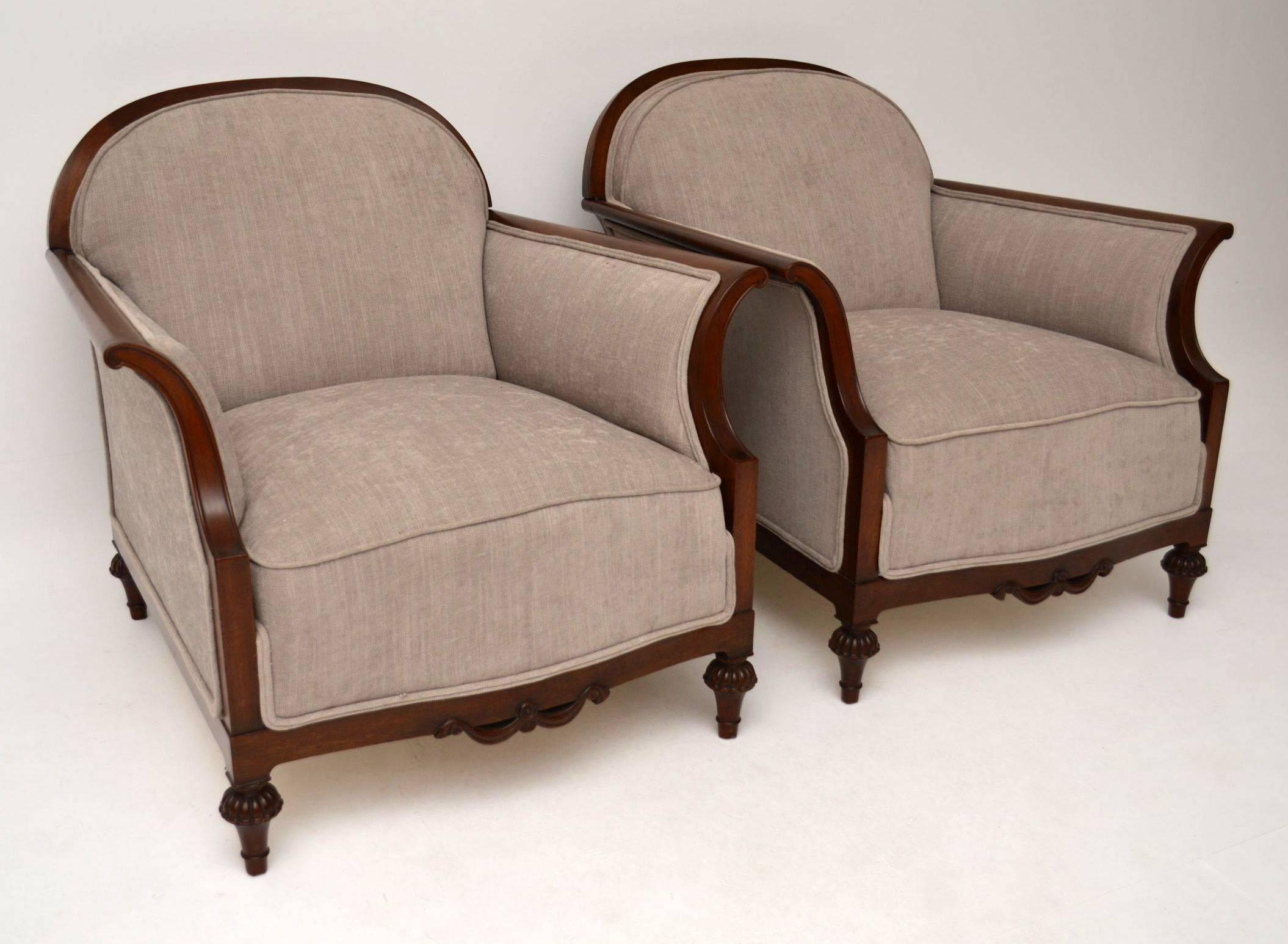 Fine quality pair of antique Swedish upholstered mahogany armchairs of generous proportions and extremely comfortable. They have just come over from Sweden, been polished & re-upholstered in a neutral stain resistant fabric. I would date them to