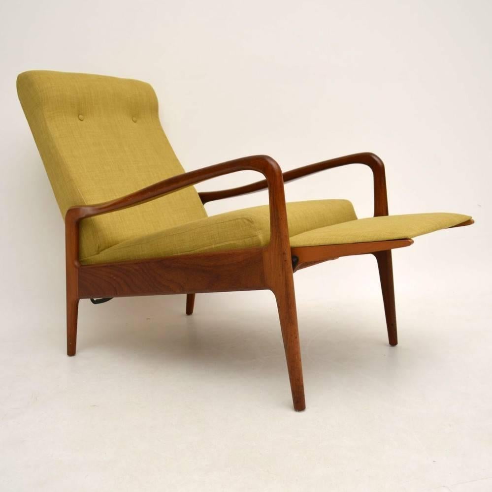 A beautiful and extremely comfortable armchair, this was made by Greaves & Thomas, it dates from the 1960s. The condition is excellent for its age, the solid teak frame is clean, sturdy and sound, with some minor wear here and there. We have had