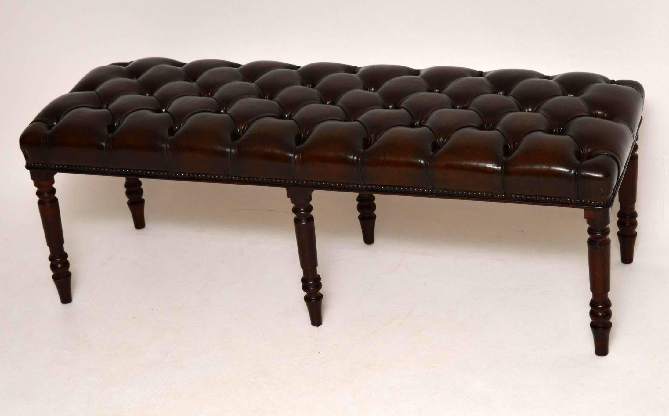 Contemporary Antique Deep Buttoned Leather Stool on Mahogany Legs