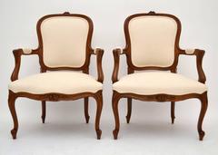 Pair of Antique French Carved Salon Cream Armchairs