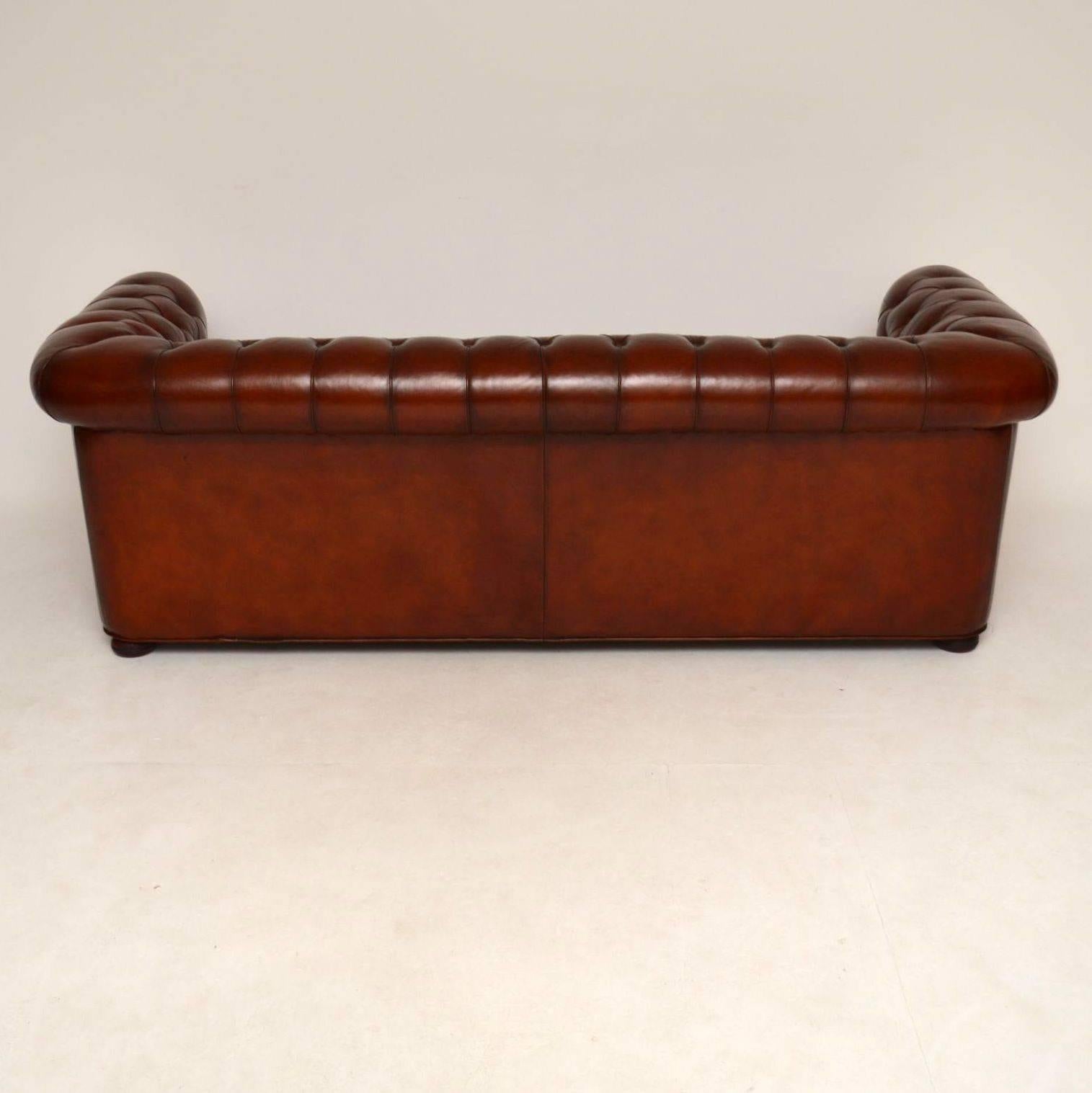 Antique Leather Three-Seat Chesterfield Sofa 1