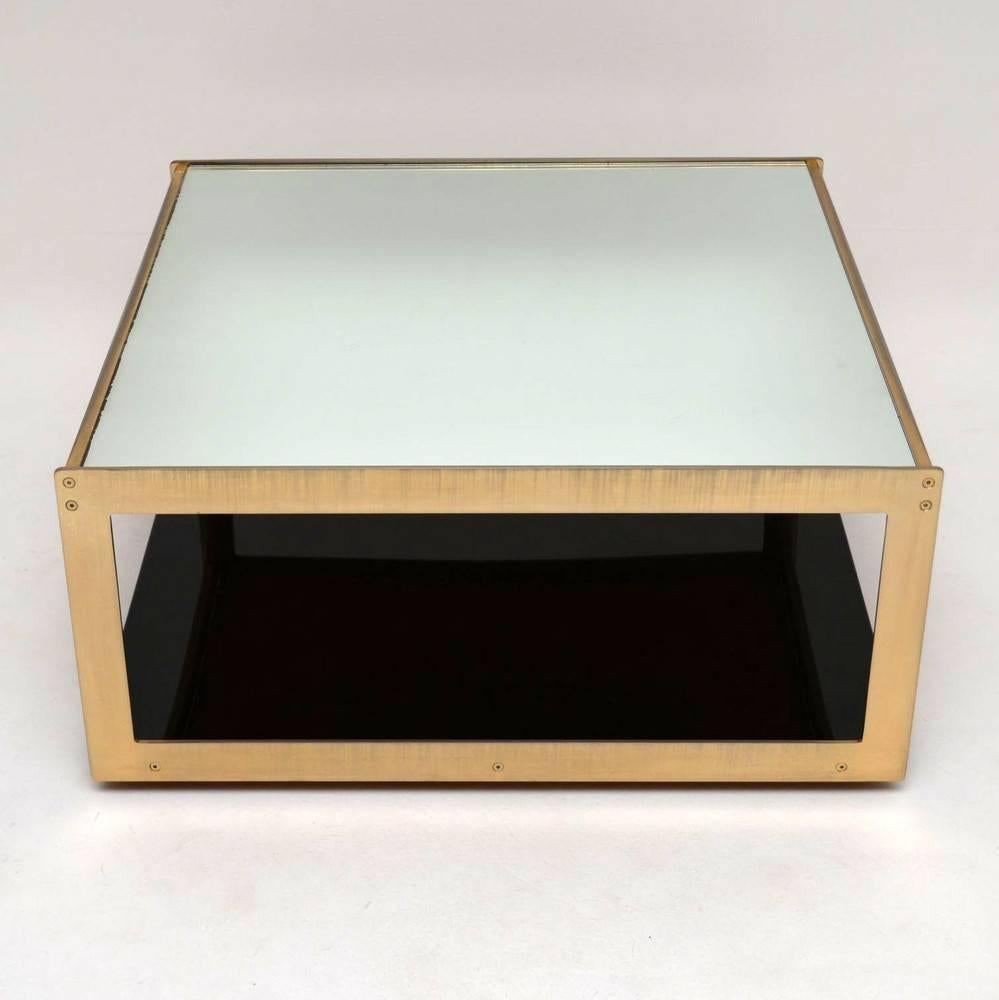 This is a stunning and exceedingly rare Merrow Associates coffee table, designed by Richard Young and dating from the 1970s. Merrow Associates furniture is rare enough, but this is something we've never seen before. It has the usual shape and design