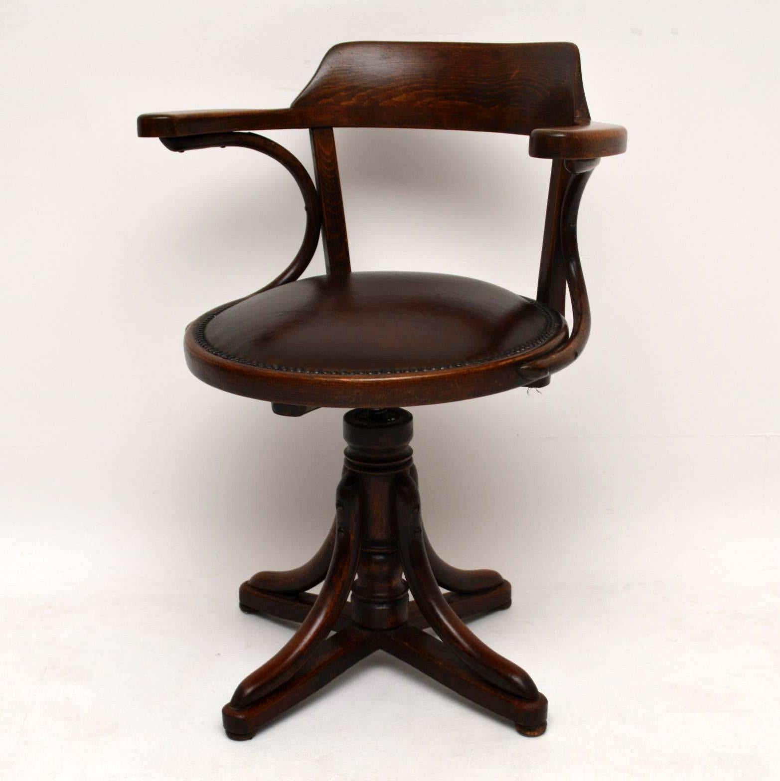 Antique Thonet bentwood revolving desk chair in good original condition, with an adjustable height mechanism. This is quite a rare item and a very nice example of this kind of thing. I believe this was made around the 1890-1910 period. We have just