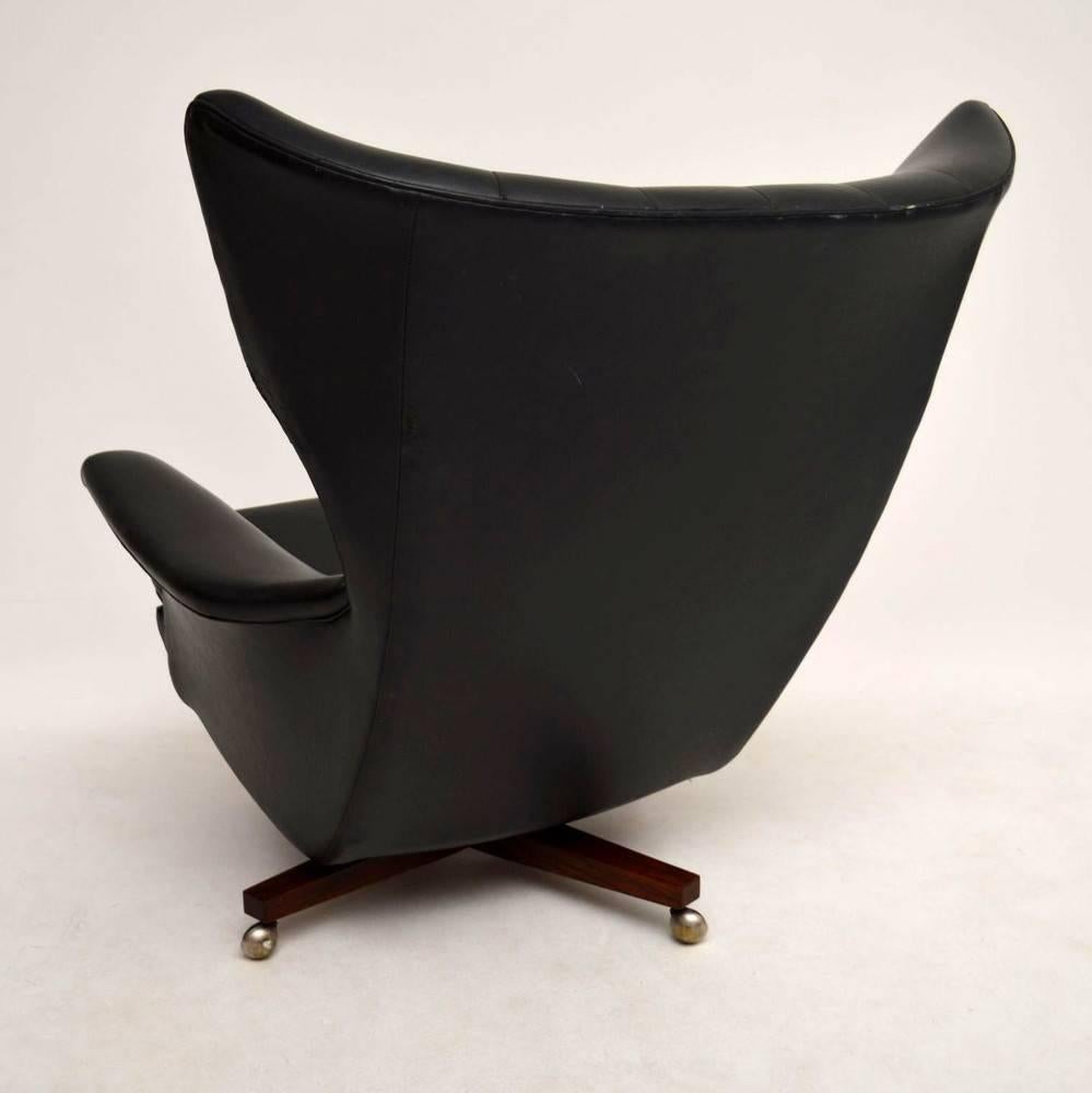 Rosewood Retro Swivel Rocking Armchair by G-Plan Vintage, 1960s