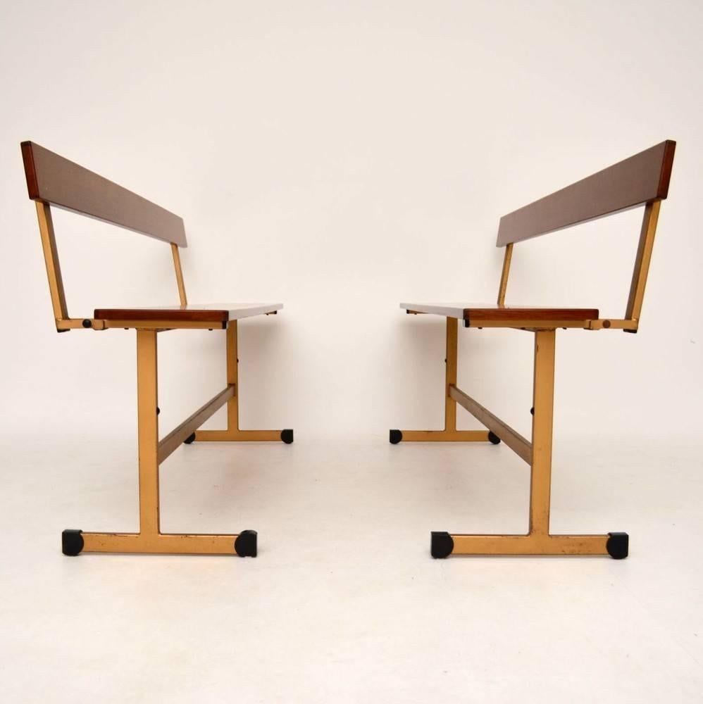 A very unusual pair of folding benches, these were made by staples and they date, circa 1960s. The condition is very good for their age, the Teak is mostly in excellent condition. One of the seats has a few marks, and also behind one of the backs,