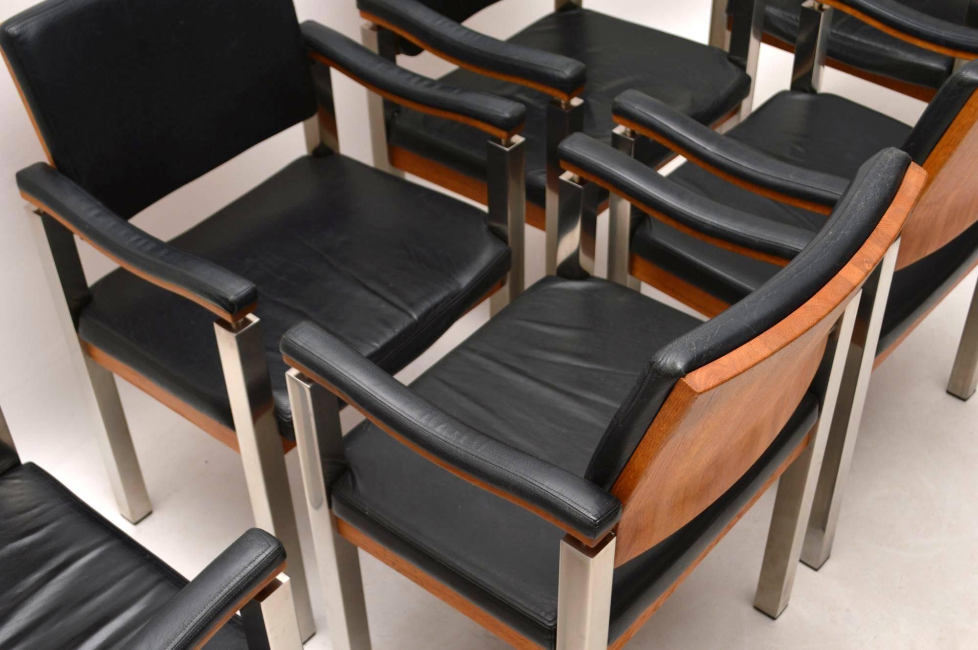 A very unusual and very stylish set of six dining chairs, these date from around the 1970s. They are very well made and are extremely comfortable. The condition is excellent for their age, with only some very minor wear here and there. The black