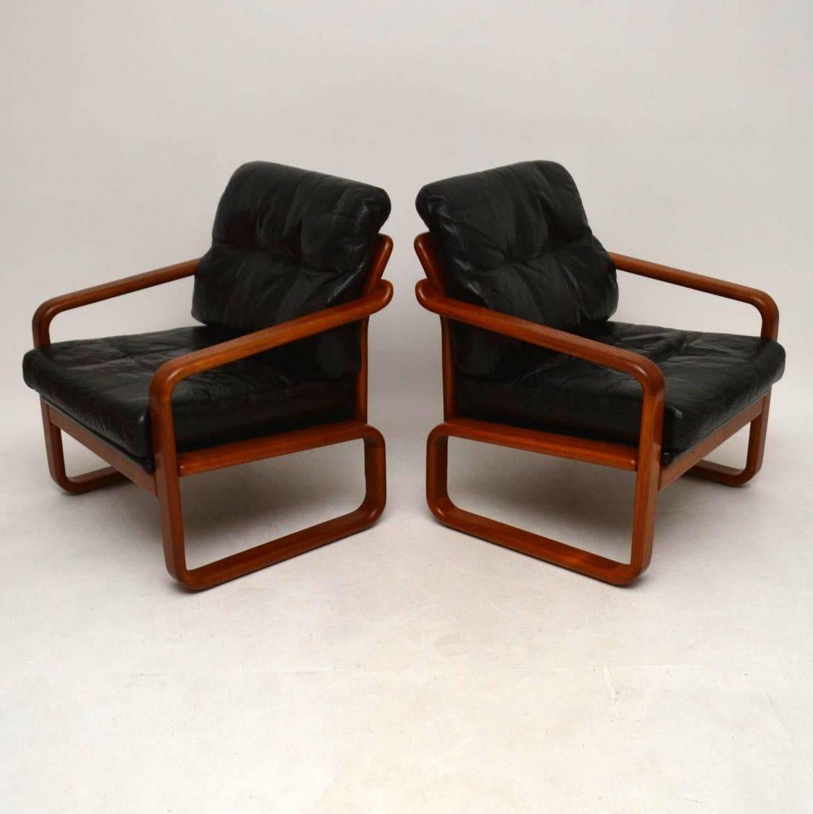 Mid-20th Century Pair of 1960s Danish Teak and Leather Armchairs