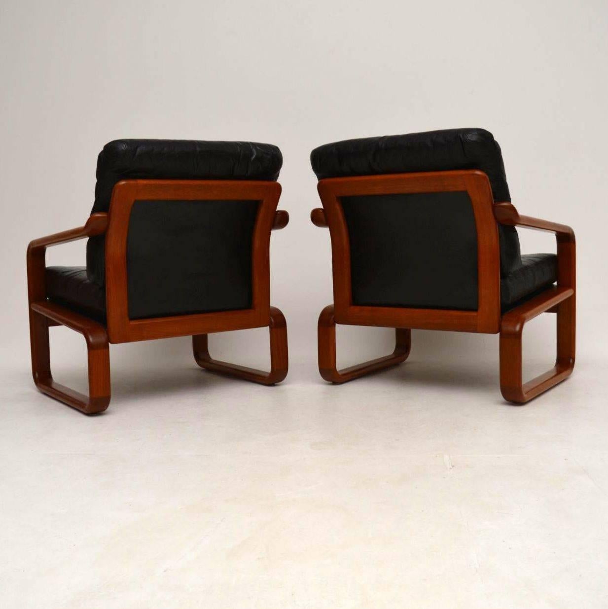 Pair of 1960s Danish Teak and Leather Armchairs 1