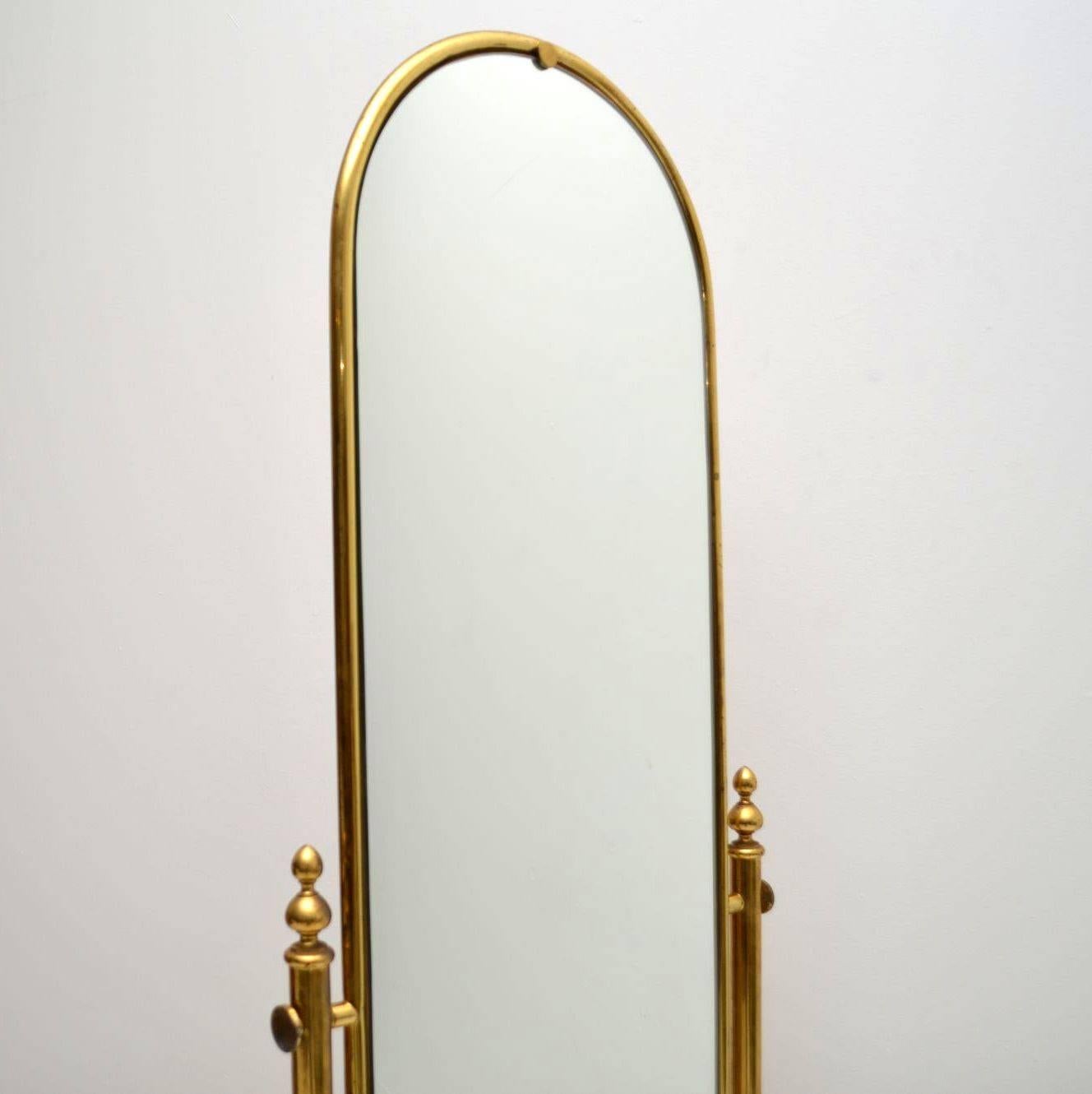 A stunning and very well made cheval mirror in brass, this dates from the 1950s. It was probably made in Italy, possibly France, and the condition is excellent for its age, with only some extremely minor surface wear here and there.

Measures: