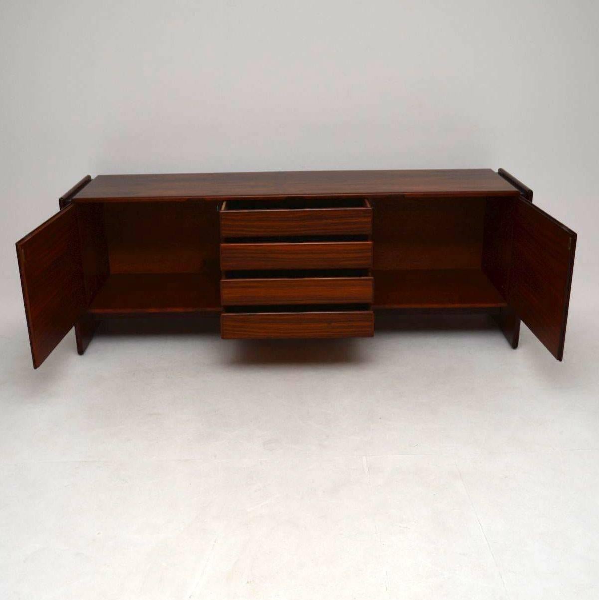 A beautiful and striking vintage sideboard, this was made in Denmark and dates from the 1960-1970s. The quality is amazing, the color and grain patterns are really beautiful. We have had this stripped and re-polished to a very high standard, the