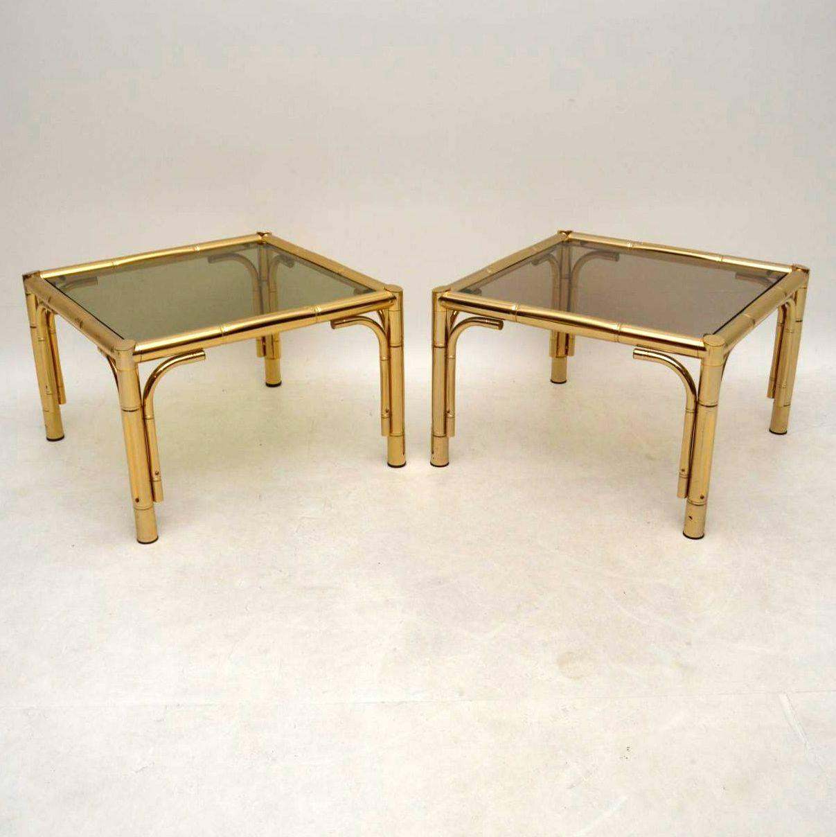 A stunning pair of side tables in brass bamboo effect, these date from the 1970s. The quality is excellent and the condition is great for their age, with hardly any wear to be seen. The brass is clean, sturdy and sound, the glass is free from any