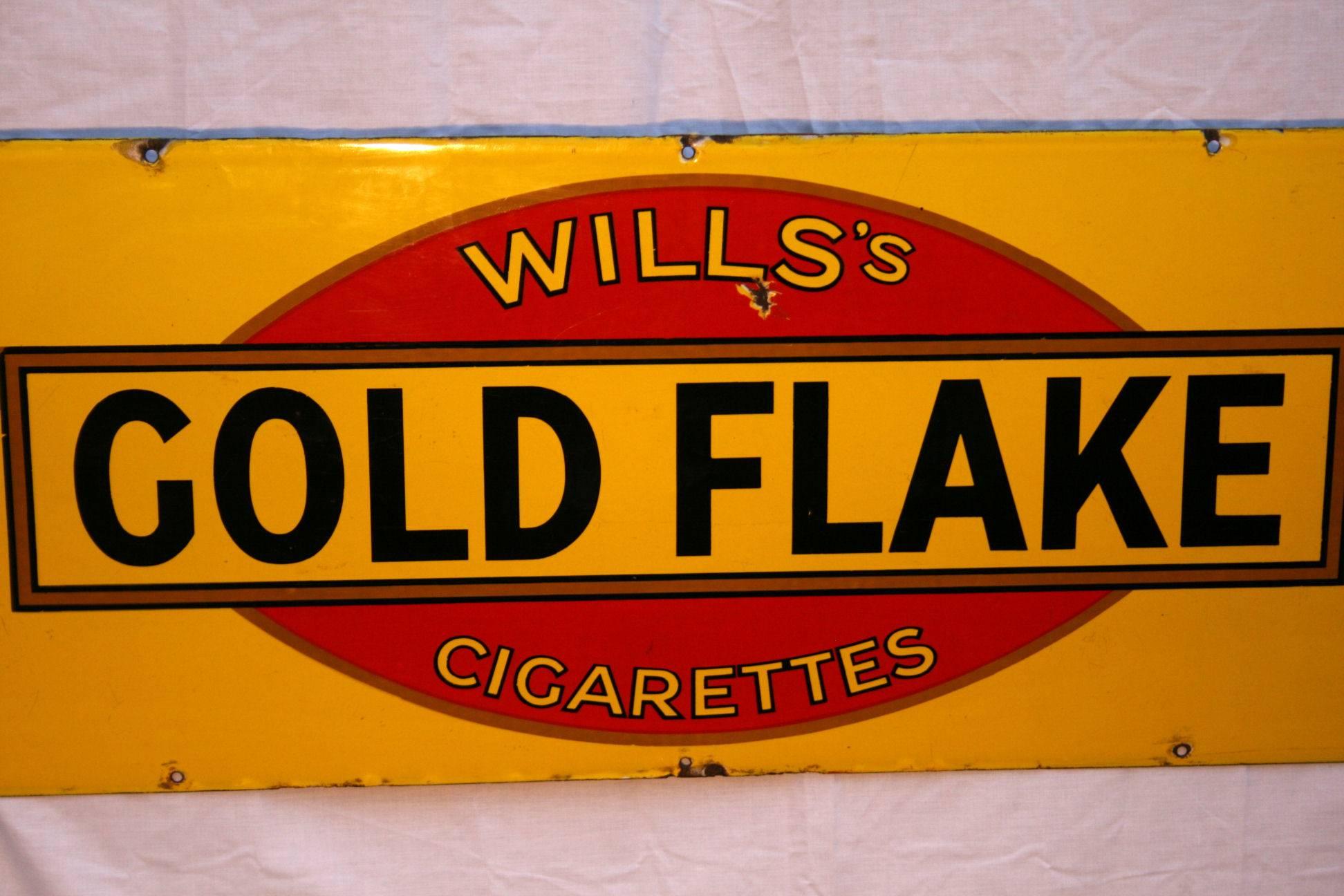 Original Wills Gold Flake advertising enamel sign
Old English railway station advertising sign for Wills gold flake probably early 1900s.

Size: 183 cm long x 38 cm high.
In good condition for age but with wear and tear which only adds to its