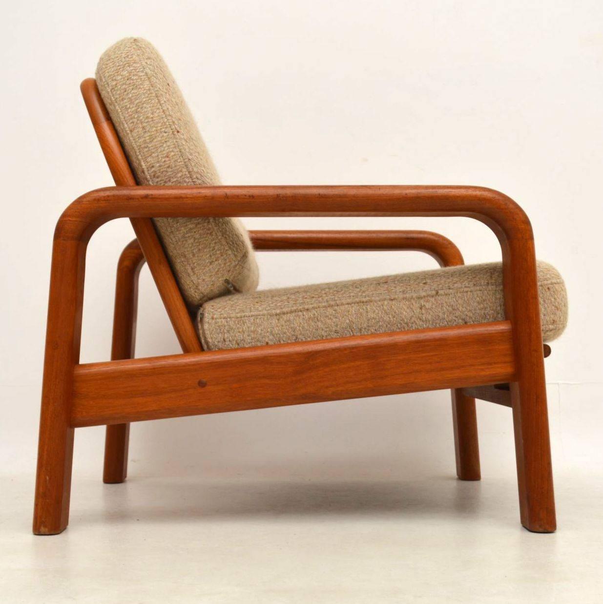 A stylish and very well made pair of solid teak vintage armchairs, these were made in Denmark, they date from the 1960s-1970s. The quality is amazing and the condition is great for their age. The frames are clean sturdy and sound with only some