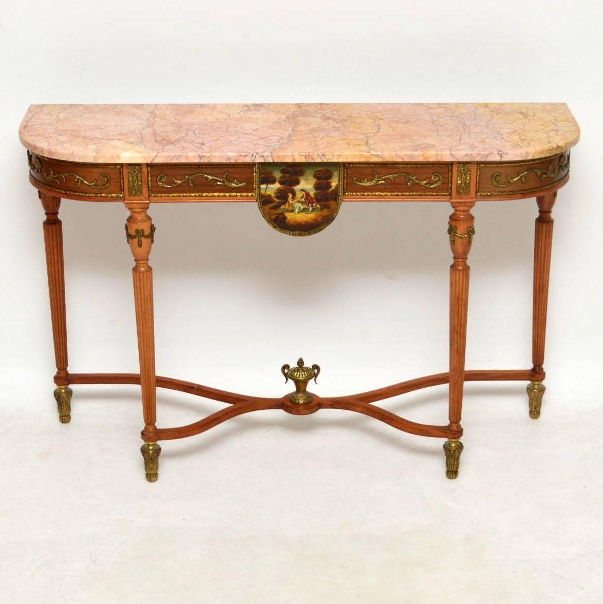 Impressive antique French Louis XV style marble-top console side table, in excellent condition and dating to around the 1950s period. The detachable marble top is perfect. The base is mahogany with lots of gilt mounts and other decorations. There's