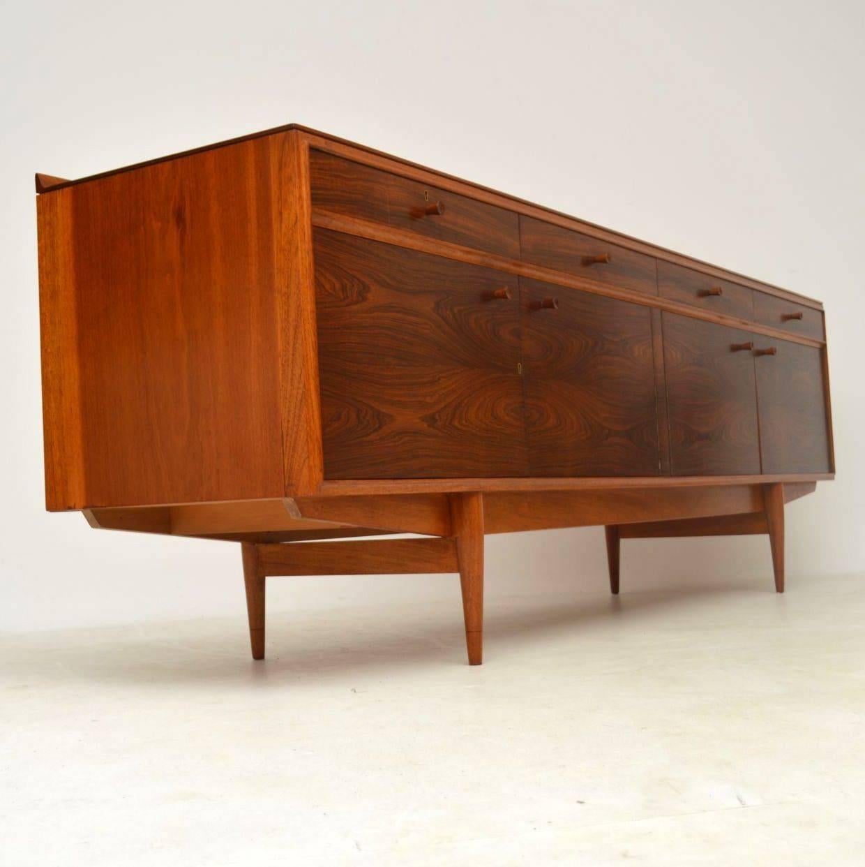 A stunning and very rare vintage sideboard designed by Robert Heritage and made by Archie Shine, this dates from the 1960’s. The top and sides are Mahogany,  we have had this stripped and re-polished to a very high standard, the condition is superb