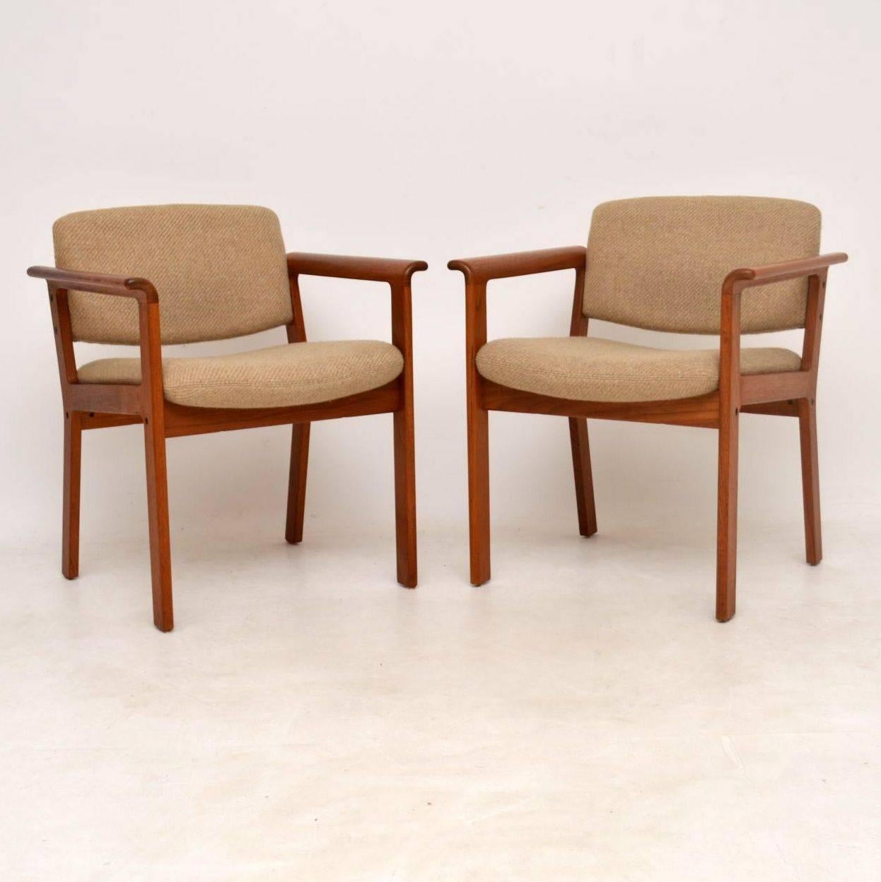 A very well made and stylish pair of solid teak armchairs designed by Erik Kirkegaard. These were made in Denmark by Hong Stolefabrik, they date from, circa 1960-1970s. The condition is great for their age, the teak frames are very clean, sturdy and