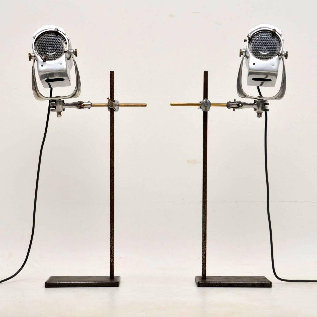 An amazing pair of vintage table lamps / spotlights, these date from around the 1950-1960s. They were made by Century Lighting Inc in New York, they have been re-wired and are in good working order. The stands were probably added later but they are